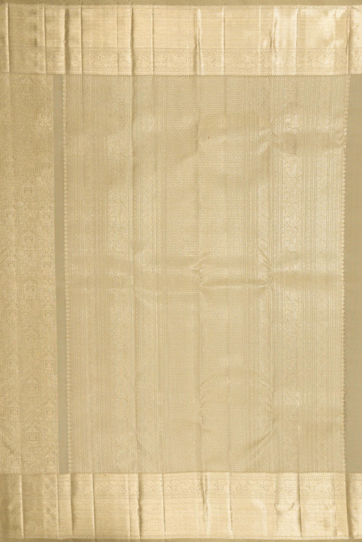 Close up image of the pallu of Beige Dual Tone Kanchipuram Silk Saree with Zari Brocade on the body and Zari Border. 