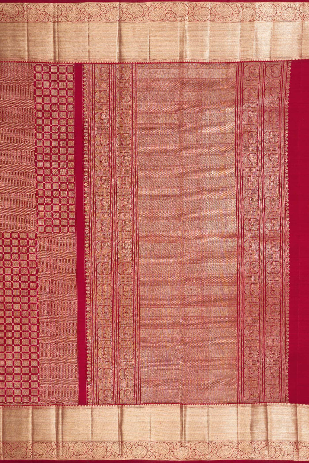 Close up image of the pallu of Maroon Kanchipuram Silk Saree with Zari Brocade on the body and Zari Border. 