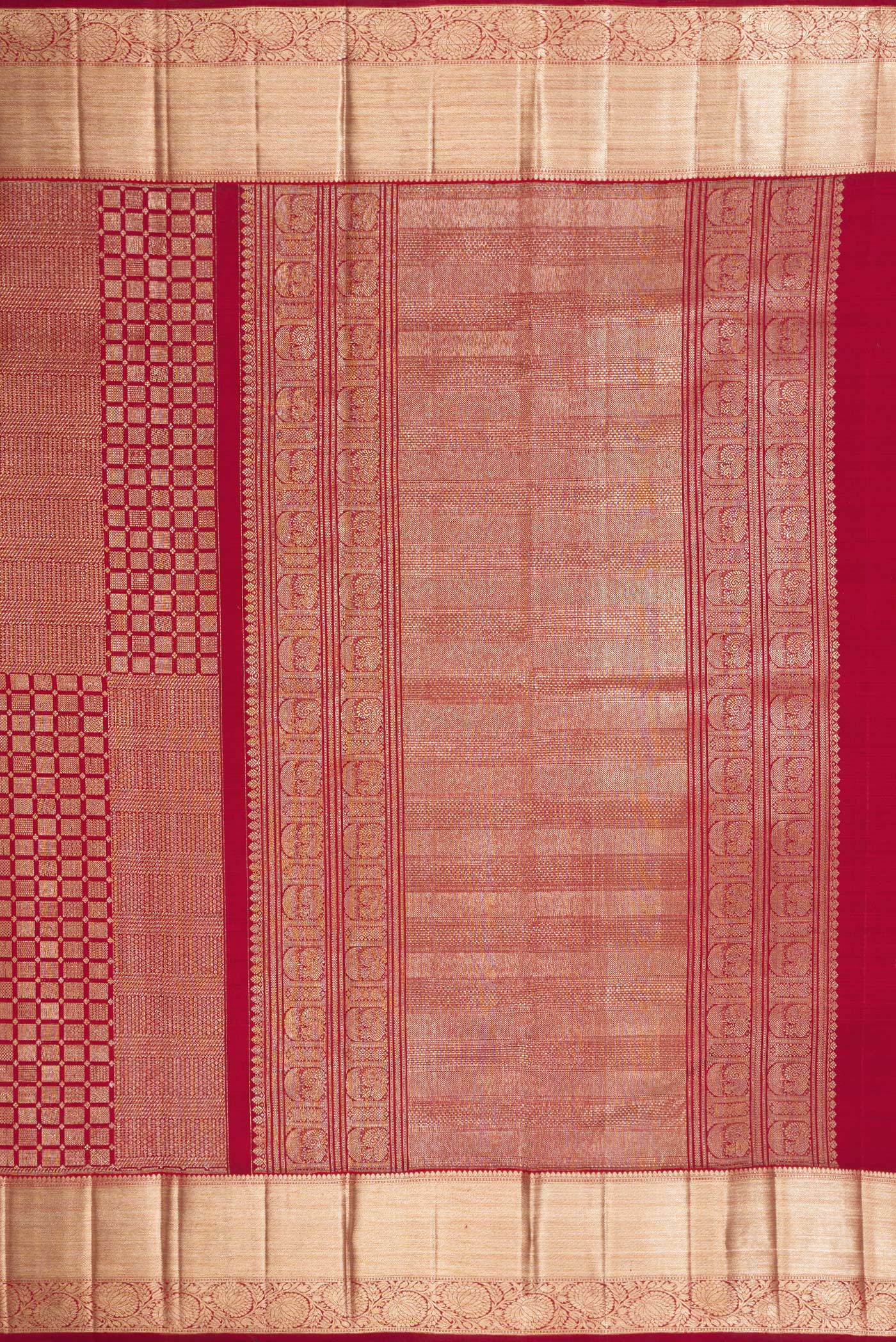 Close up image of the pallu of Maroon Kanchipuram Silk Saree with Zari Brocade on the body and Zari Border. 