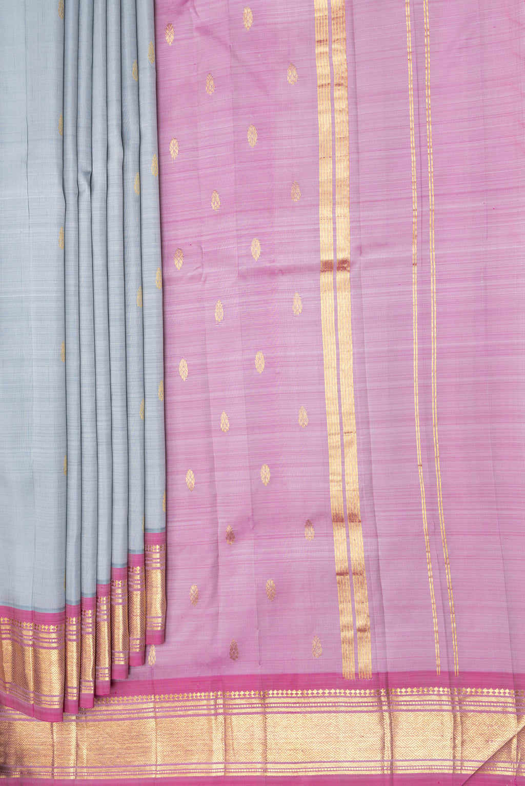 Pleats and pallu of Grey Kanjivaram Silk Saree with Zari Butta on the body and One Side Border. 