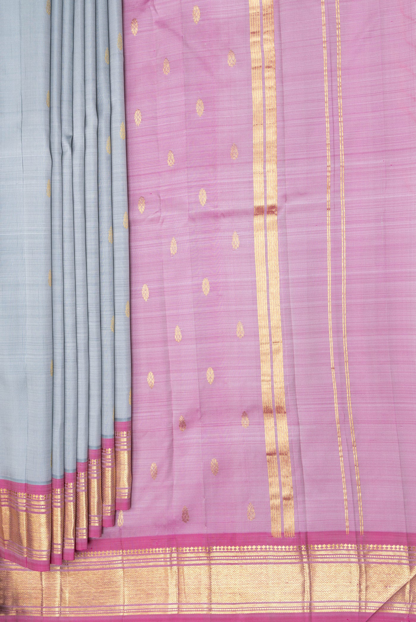 Pleats and pallu of Grey Kanjivaram Silk Saree with Zari Butta on the body and One Side Border. 