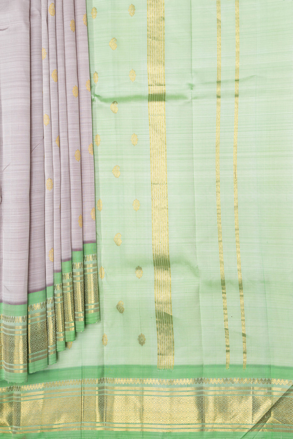 Pleats and pallu of Rose Gold Dual Tone Kanjivaram Silk Saree with Zari Butta on the body and One Side Border. 