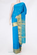 Sky Blue Kanjivaram Silk Saree with Zari Butta on the body and One Side Border.  displayed on a mannequin