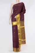 Coffee Brown Kanjivaram Silk Saree with Zari Butta on the body and Zari Border.  displayed on a mannequin