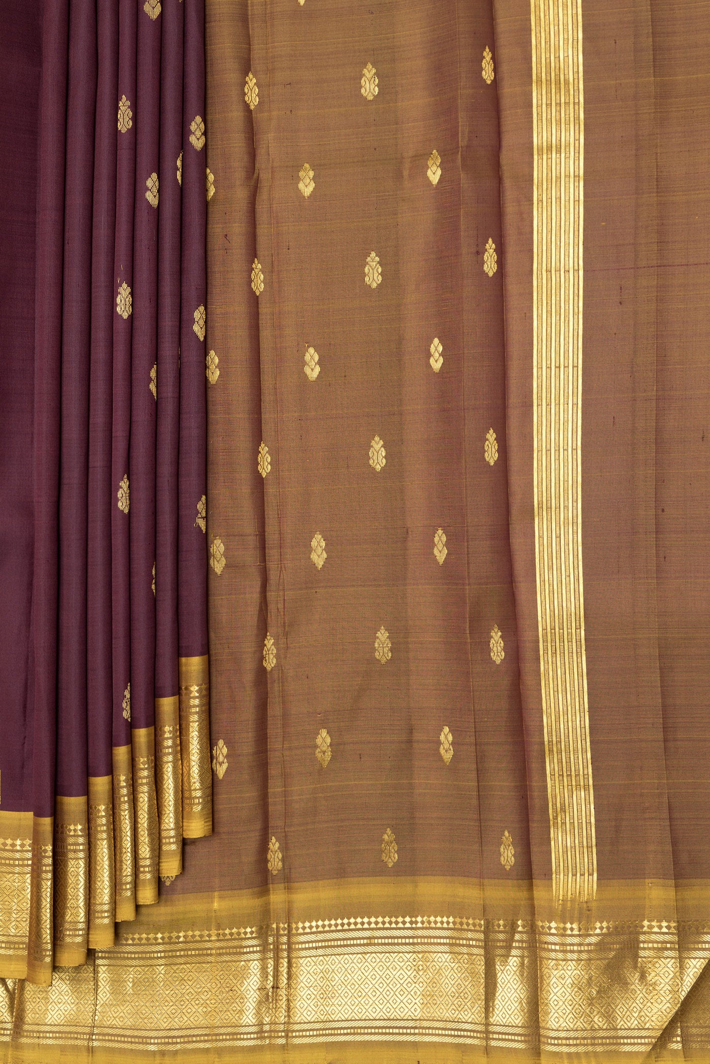 Pleats and pallu of Coffee Brown Kanjivaram Silk Saree with Zari Butta on the body and Zari Border. 