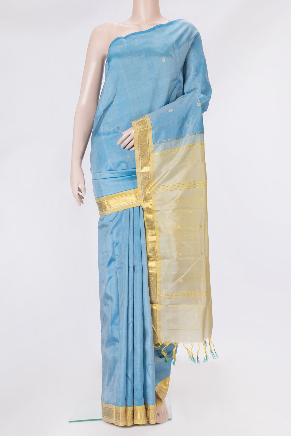 Blue Kanchipuram Silk Saree with Zari Butta on the body and One Side Border.  displayed on a mannequin