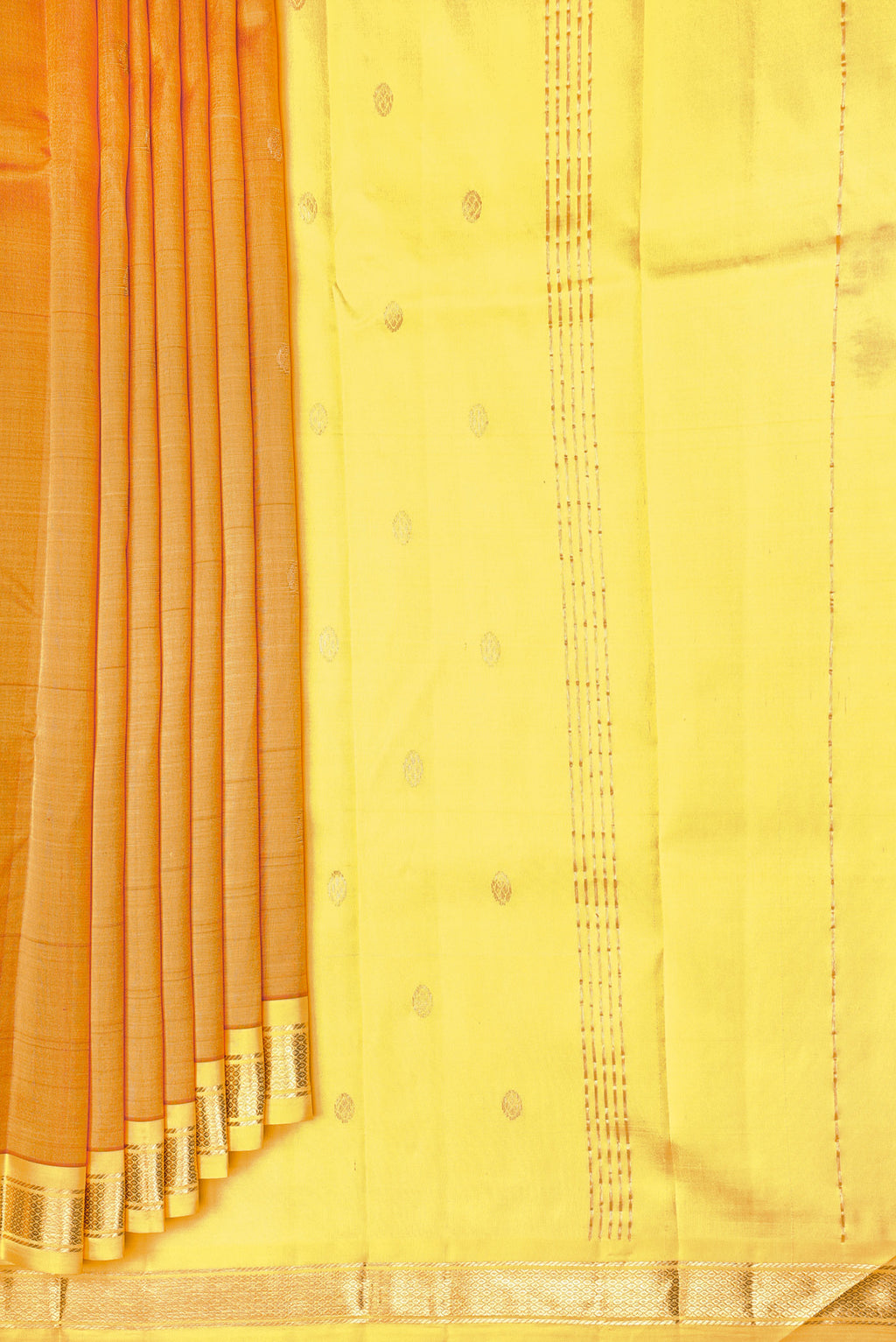 Pleats and pallu of Mustard Dual Tone Kanchipuram Silk Saree with Zari Butta on the body and One Side Border. 