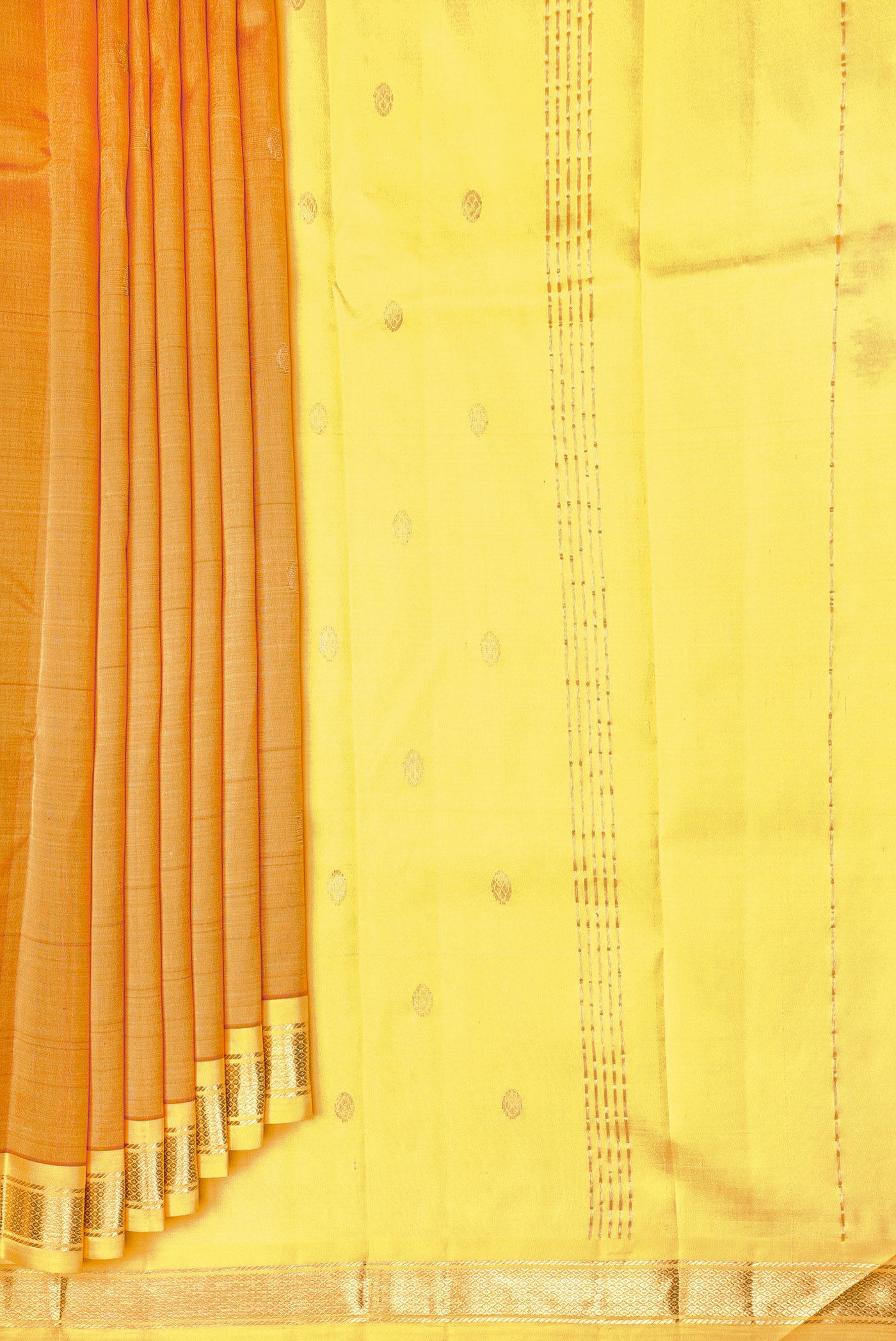 Pleats and pallu of Mustard Dual Tone Kanchipuram Silk Saree with Zari Butta on the body and One Side Border. 