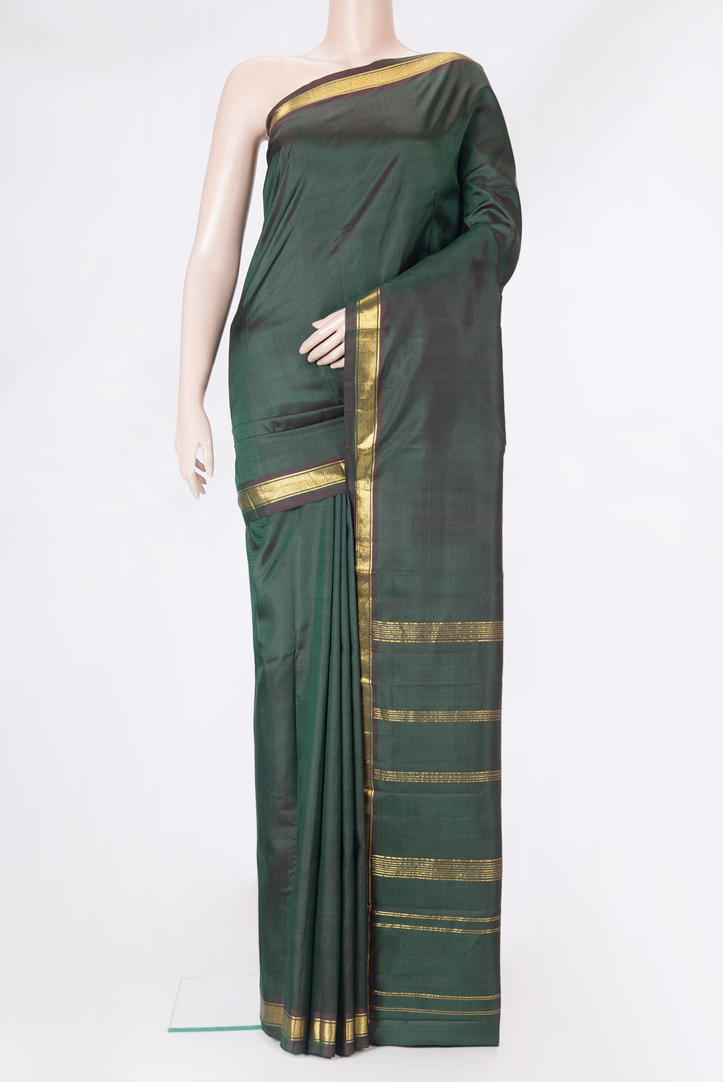 Bottle Green Dual Tone Kanjivaram Silk Saree with Plain Body and Zari Border.  displayed on a mannequin