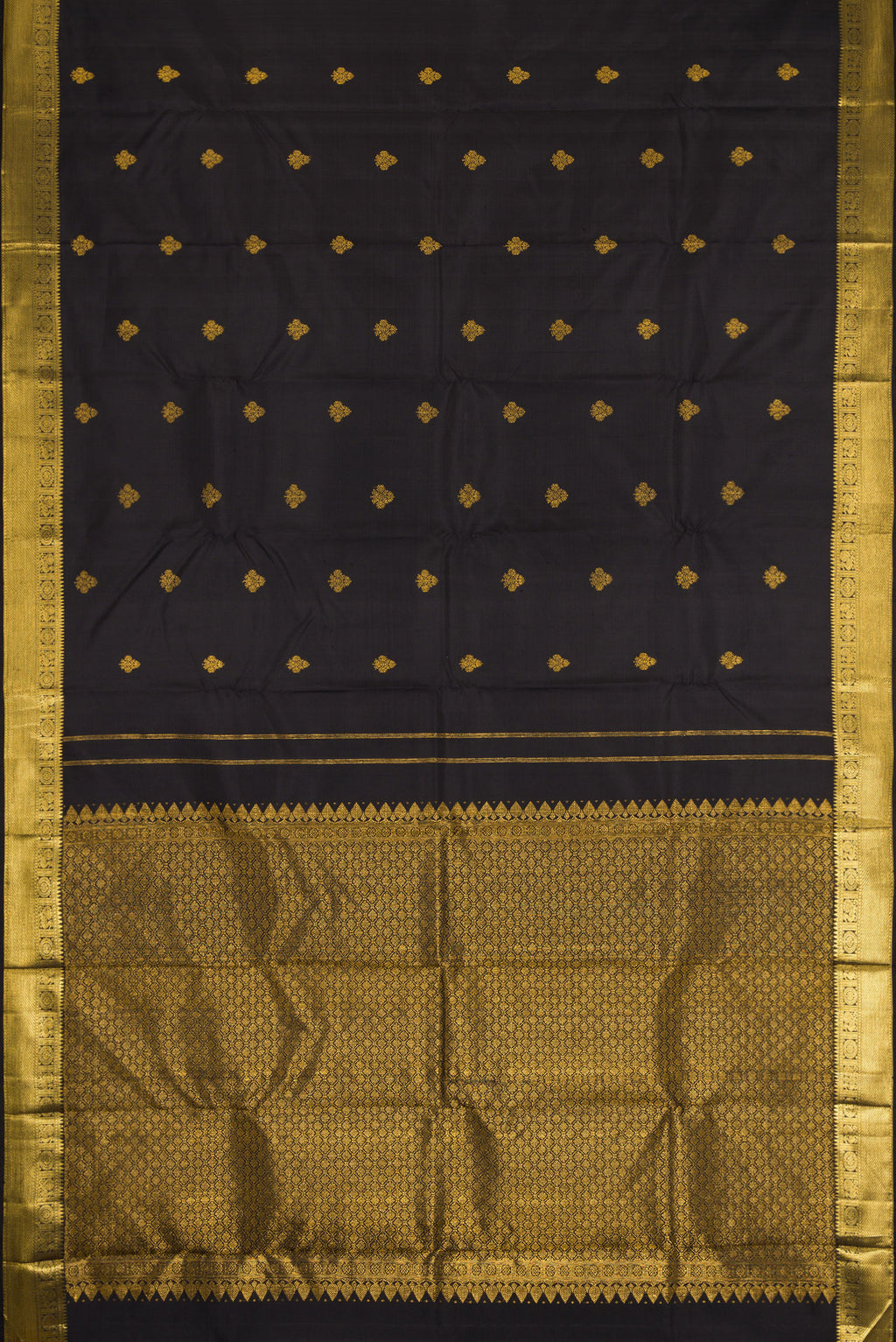 Flat view of Black Kanjivaram Silk Saree with Zari Butta on the body and Zari Border. 