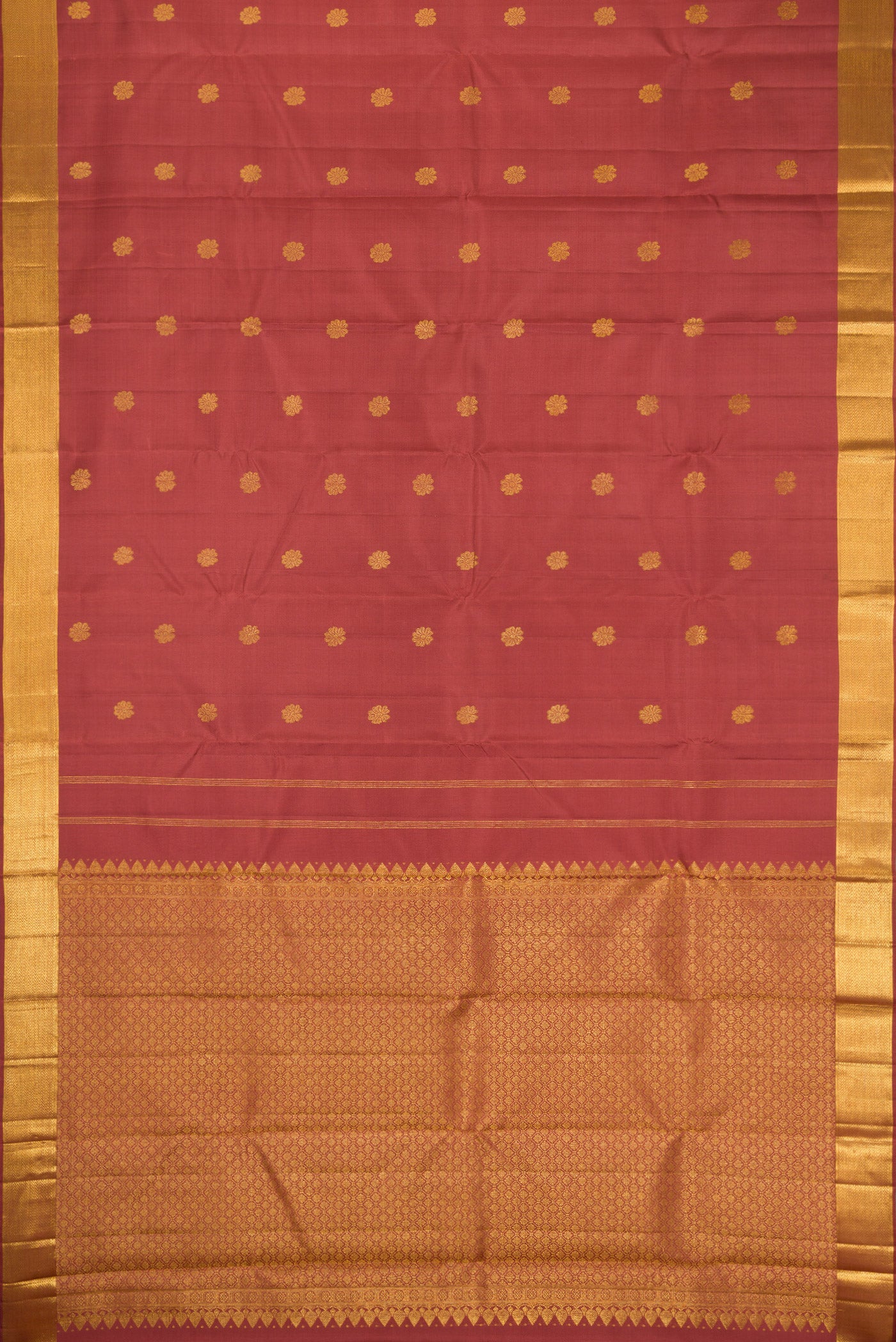 Flat view of Maroon Dual Tone Kanjivaram Silk Saree with Zari Butta on the body and Zari Border. 