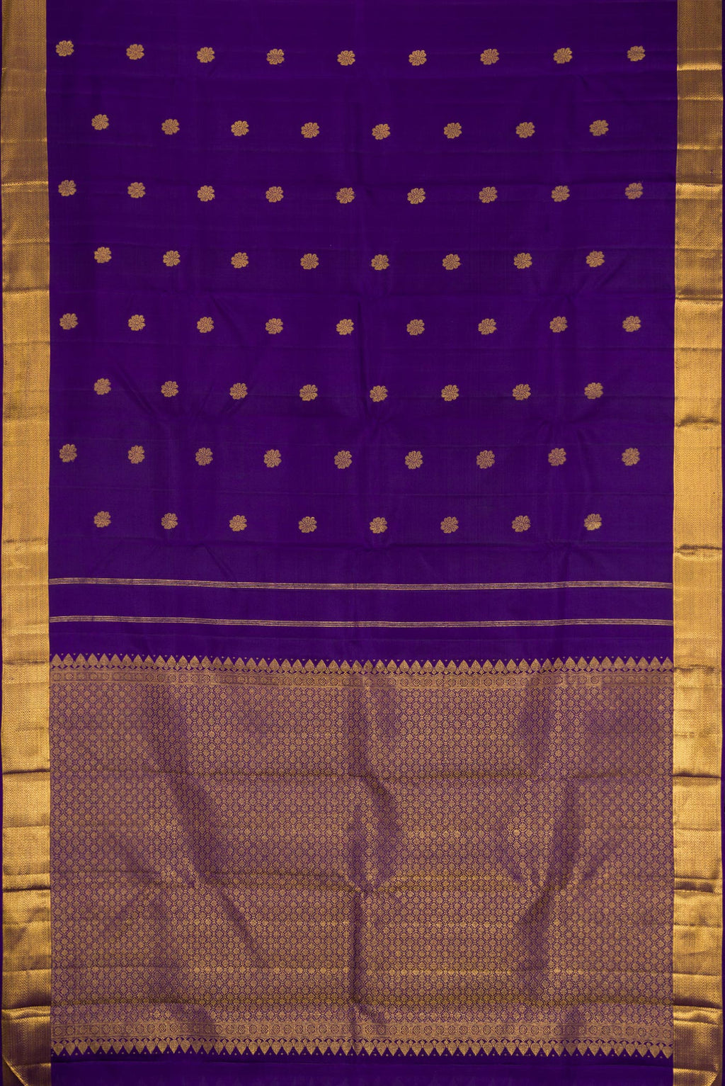Flat view of Violet Kanjivaram Silk Saree with Zari Butta on the body and Zari Border. 