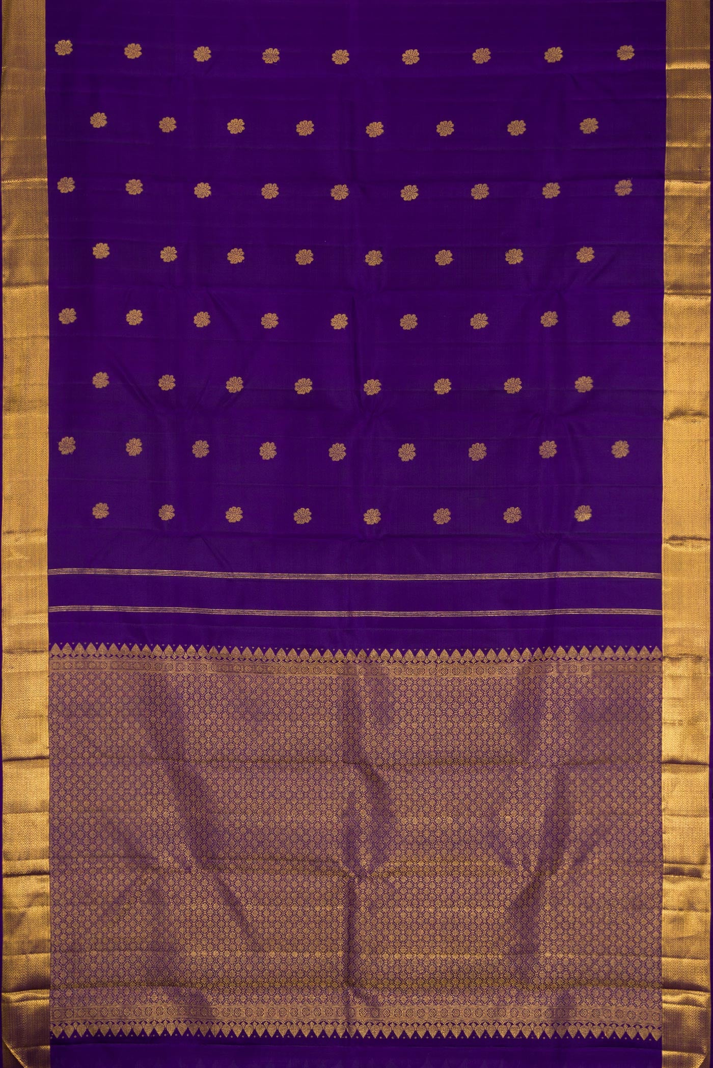 Flat view of Violet Kanjivaram Silk Saree with Zari Butta on the body and Zari Border. 