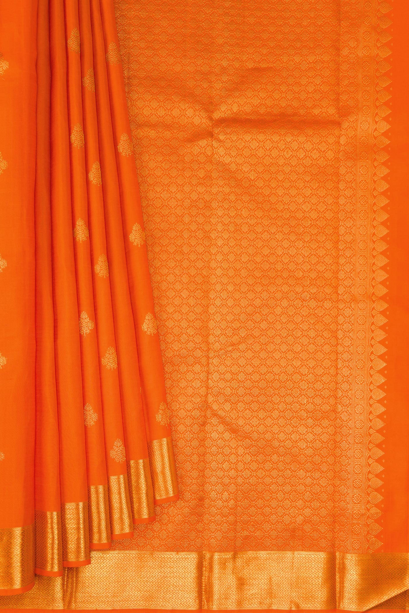 Pleats and pallu of Orange Kanjivaram Silk Saree with Zari Butta on the body and Zari Border. 