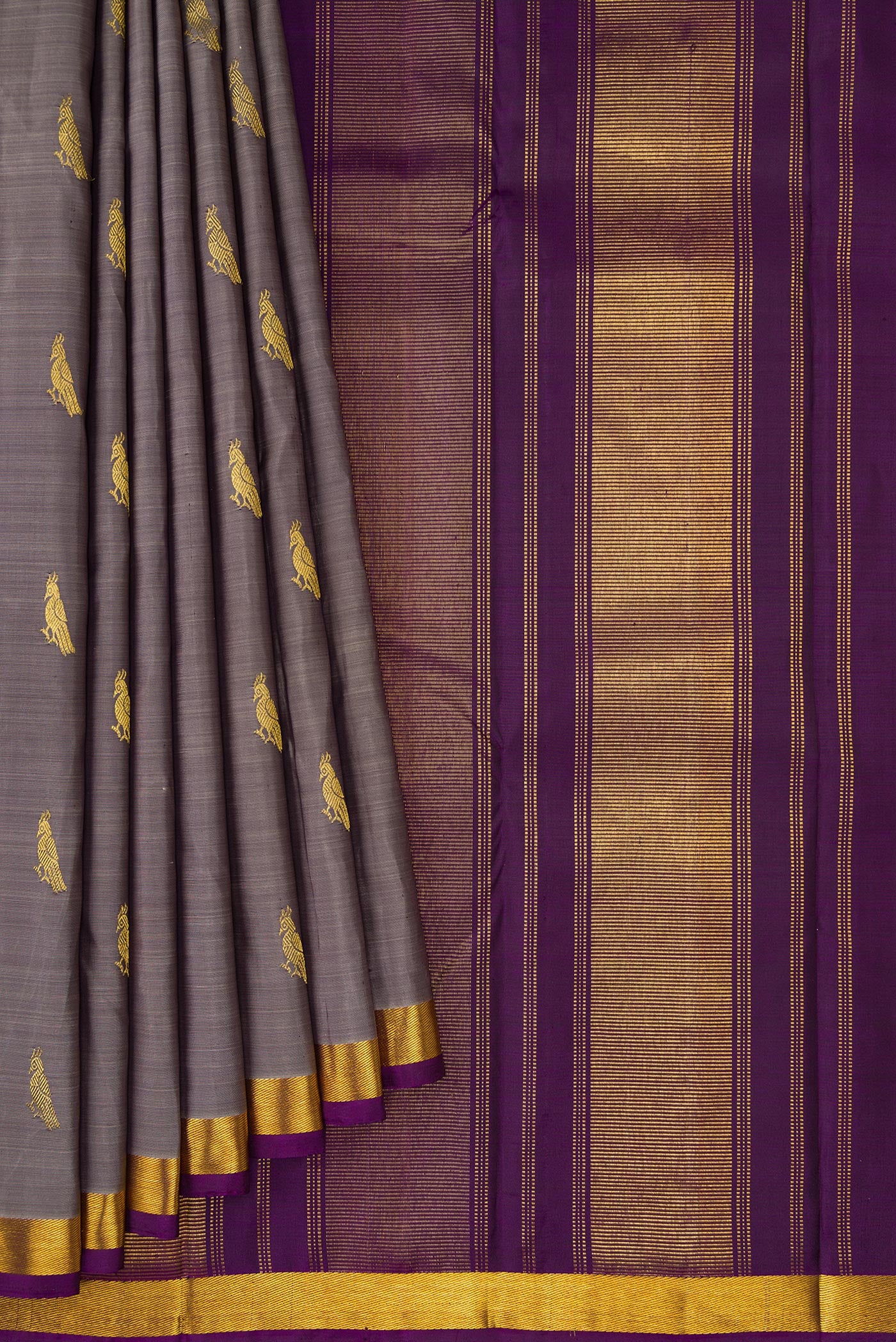 Pleats and pallu of Grey Dual Tone Kanchipuram Silk Saree with Zari Butta on the body and Zari Border. 