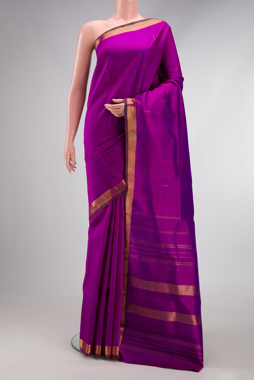 Purple Dual Tone Kanchipuram Silk Saree with Zari Butta on the body and Zari Border.  displayed on a mannequin