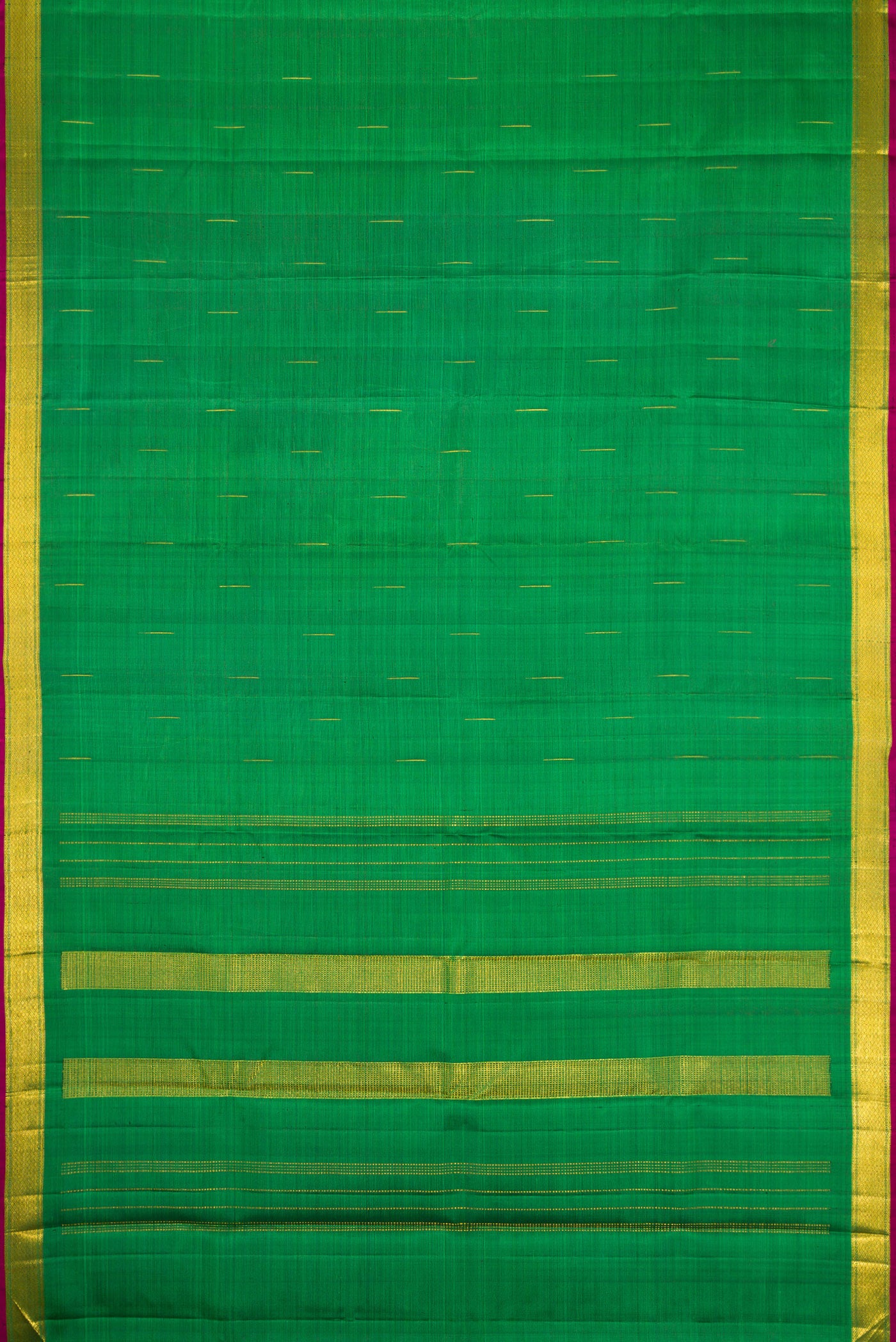 Flat view of Green Kanchipuram Silk Saree with Zari Butta on the body and Zari Border. 