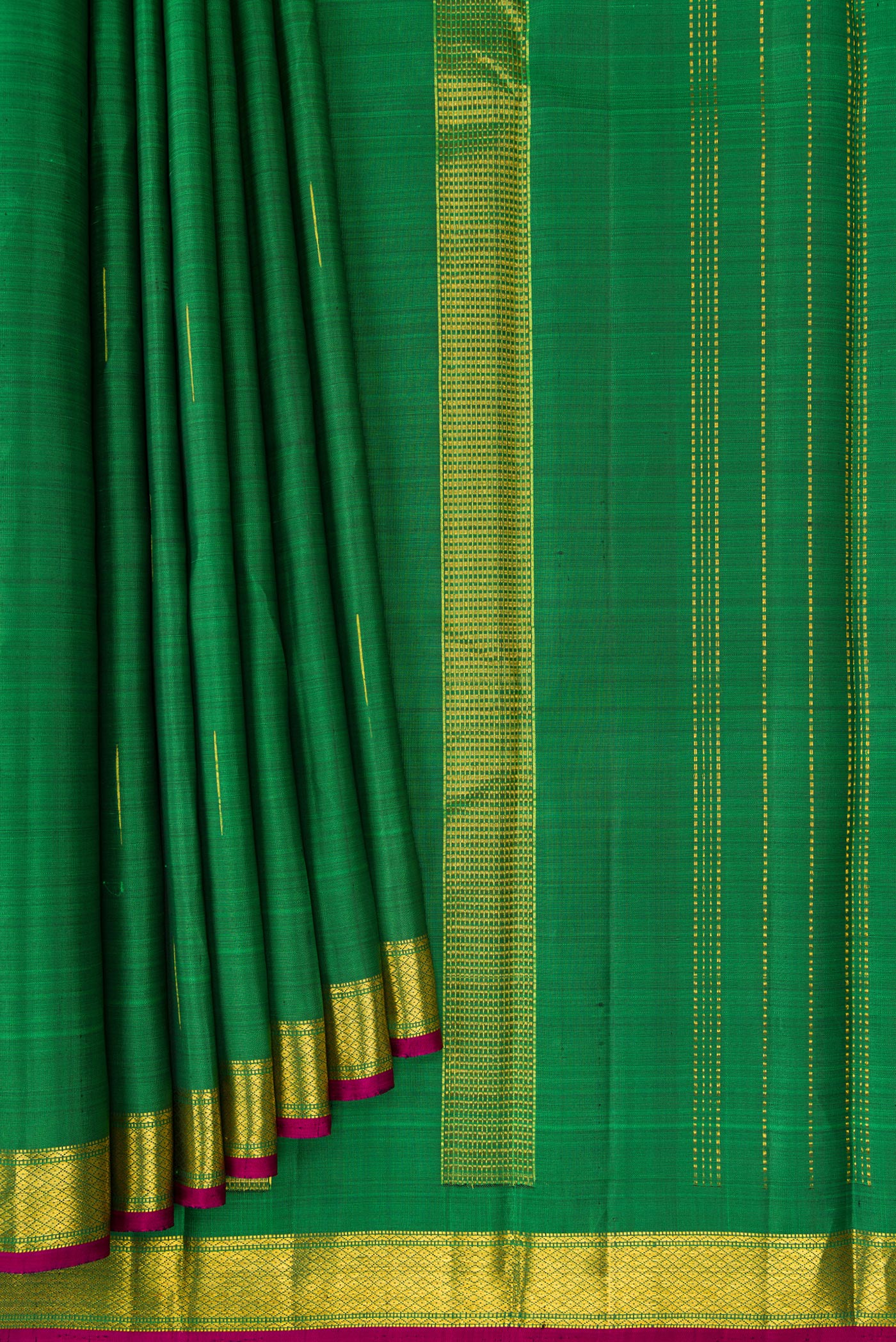 Pleats and pallu of Green Kanchipuram Silk Saree with Zari Butta on the body and Zari Border. 