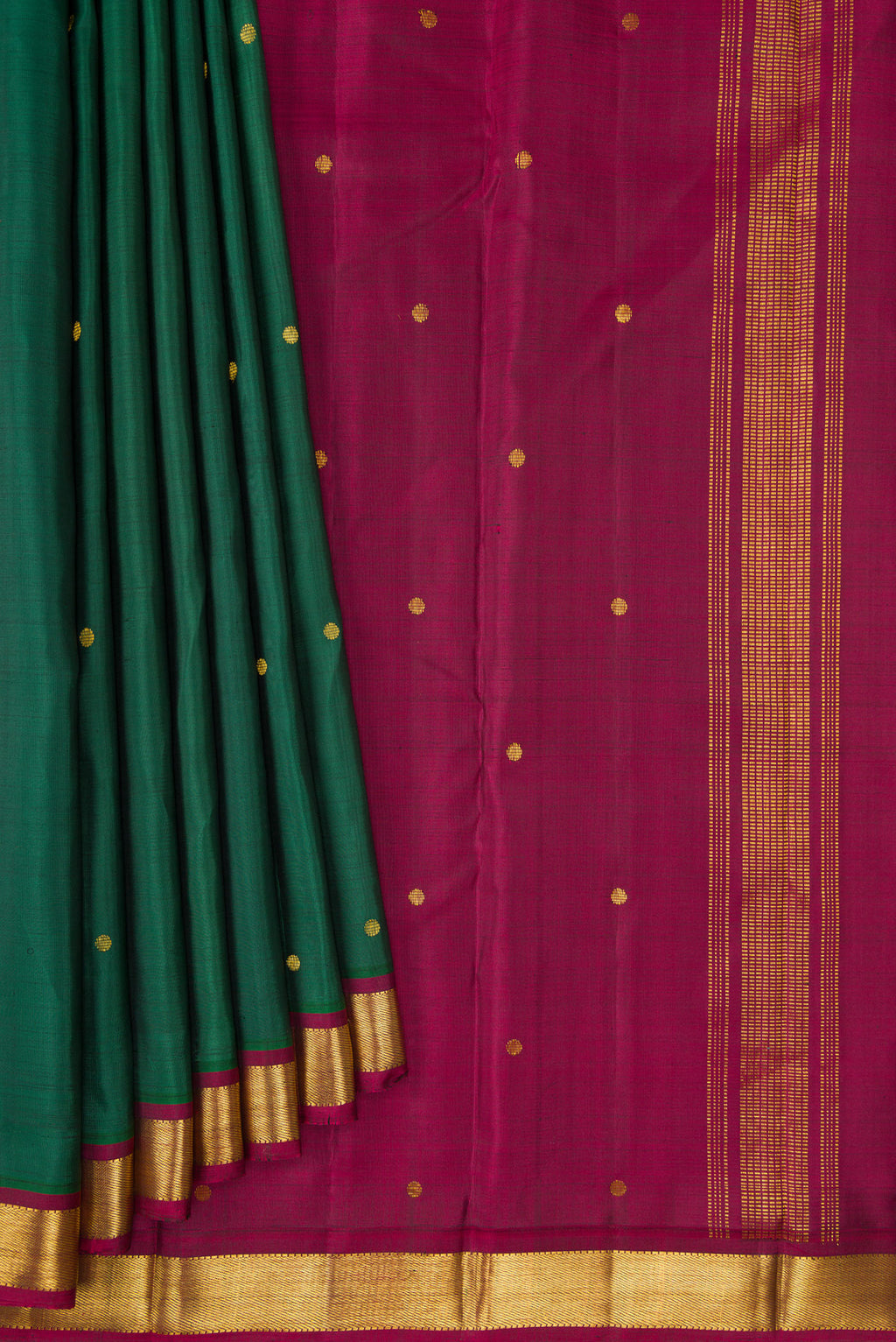 Pleats and pallu of Green Dual Tone Kanjivaram Silk Saree with Zari Butta on the body and Zari Border. 