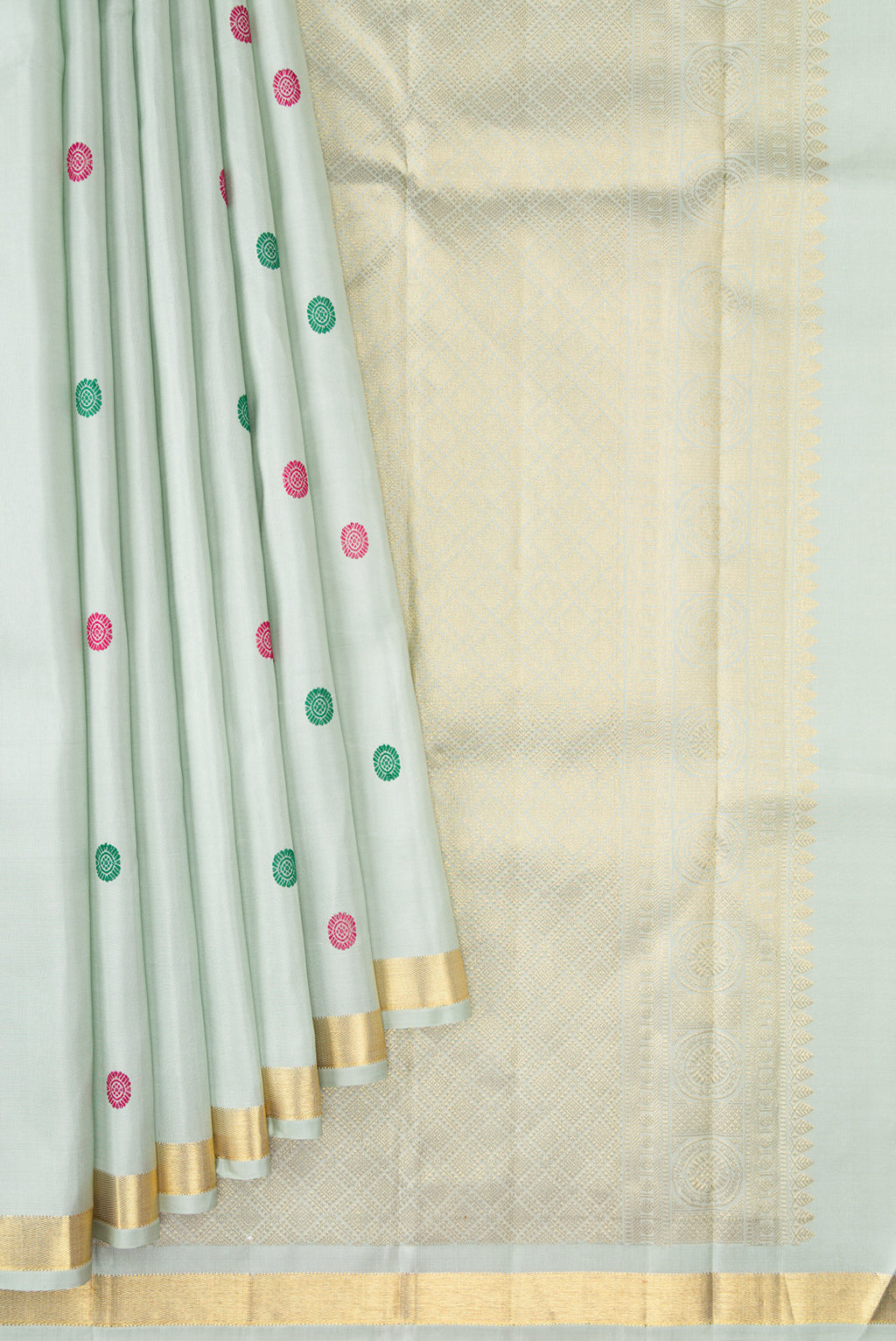 Pleats and pallu of Pista Green Kanchipuram Silk Saree with Thread Butta on the body and Zari Border. 