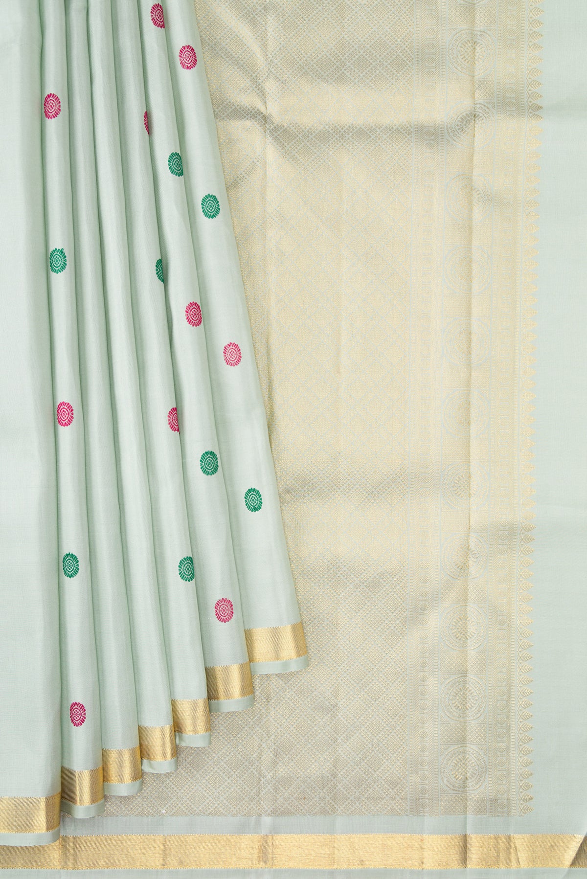 Pleats and pallu of Pista Green Kanchipuram Silk Saree with Thread Butta on the body and Zari Border. 