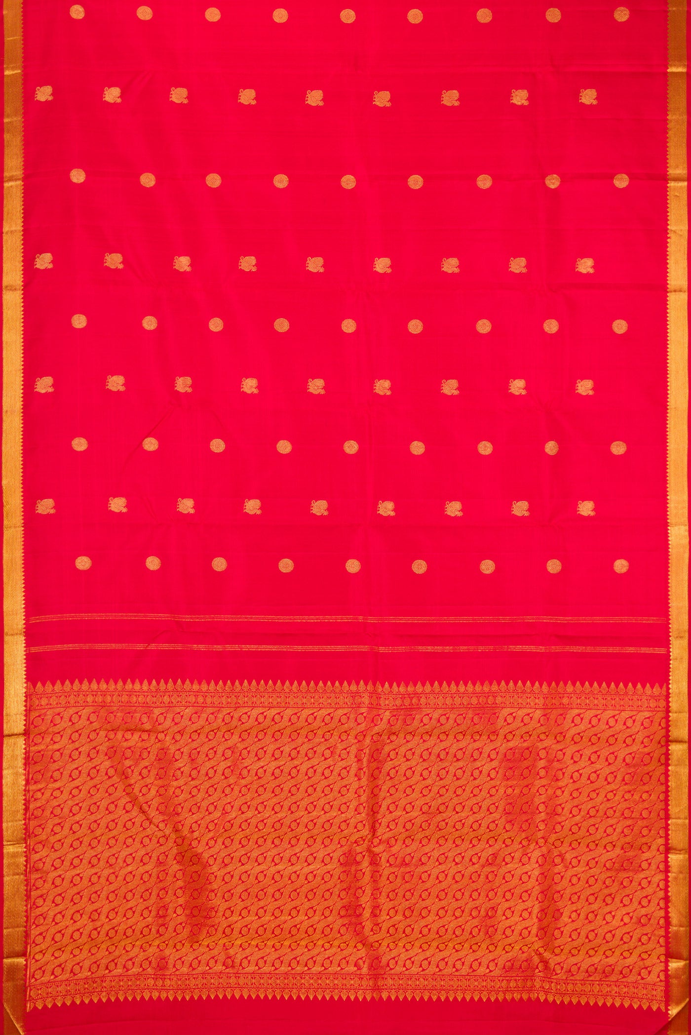 Flat view of Red Kanchipuram Silk Saree with Zari Butta on the body and Zari Border. 