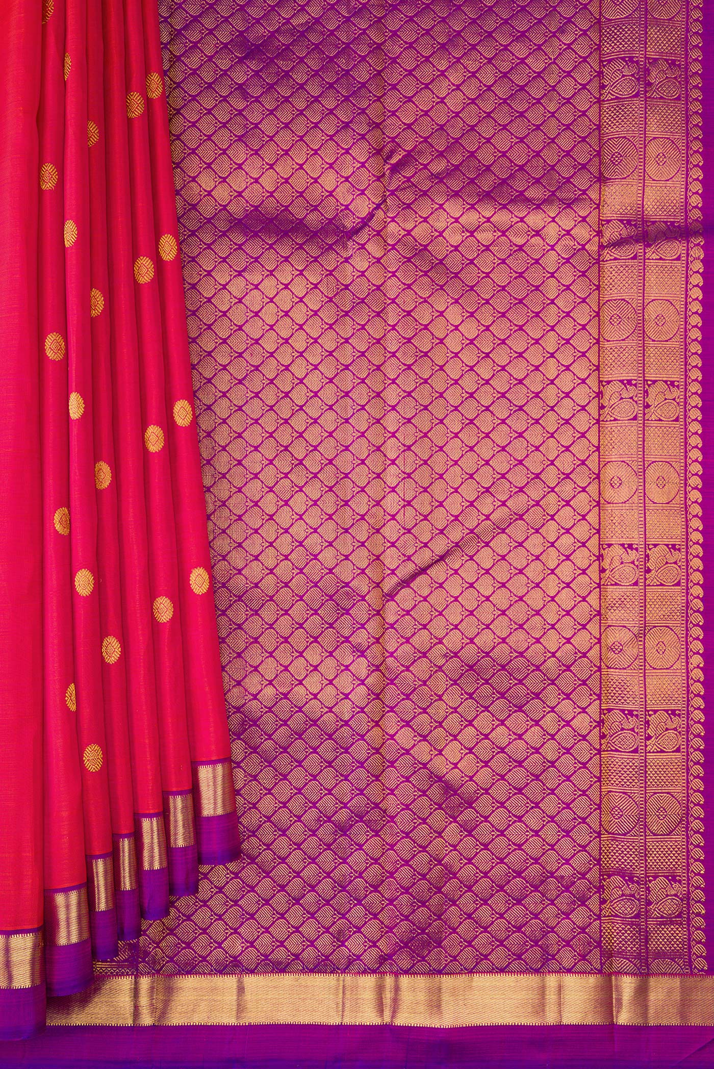 Pleats and pallu of Coral Dual Tone Kanchipuram Silk Saree with Zari Butta on the body and Zari Border. 