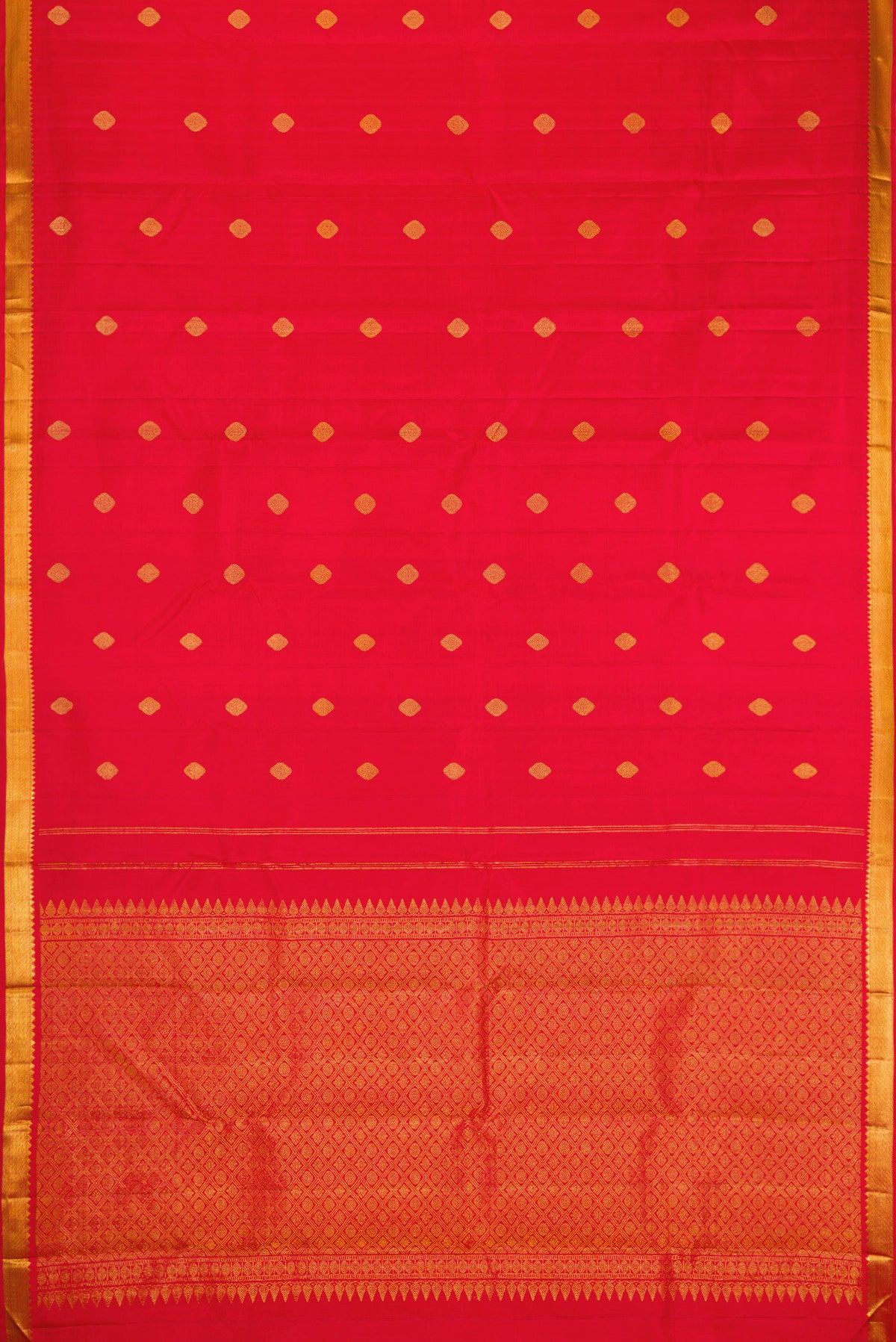 Flat view of Red Dual Tone Kanchipuram Silk Saree with Zari Butta on the body and Zari Border. 