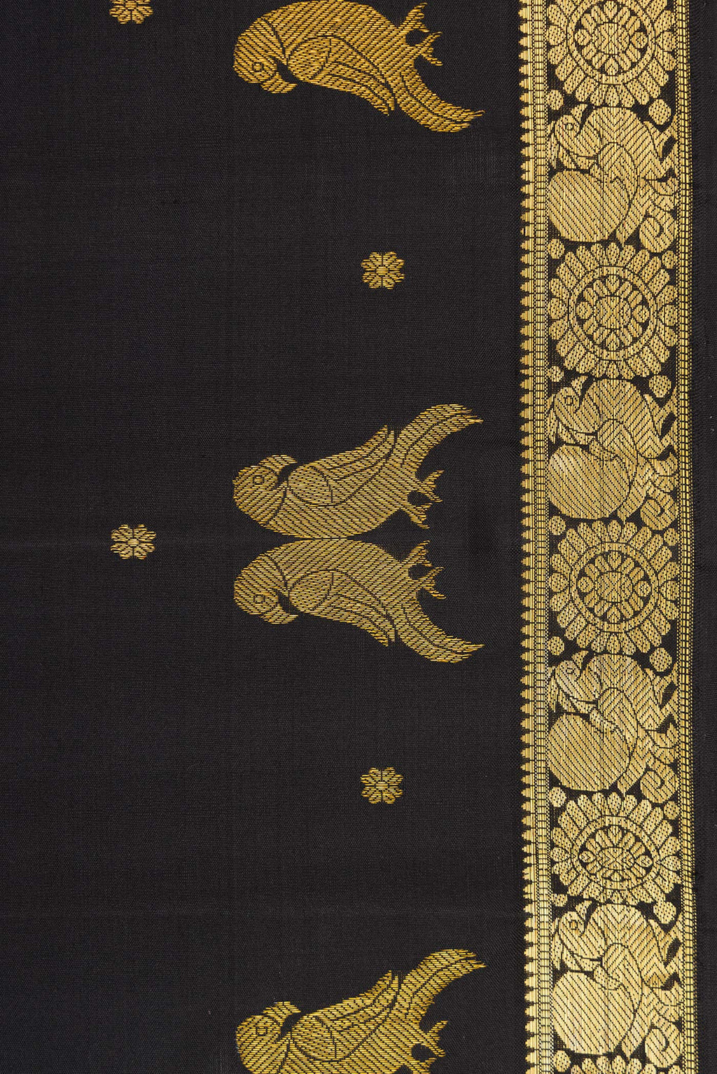 Border image of Black Dual Tone Soft Silk Saree with Zari Butta on the body and Fancy Border. 