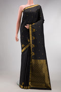 Black Dual Tone Soft Silk Saree with Zari Butta on the body and Fancy Border.  displayed on a mannequin