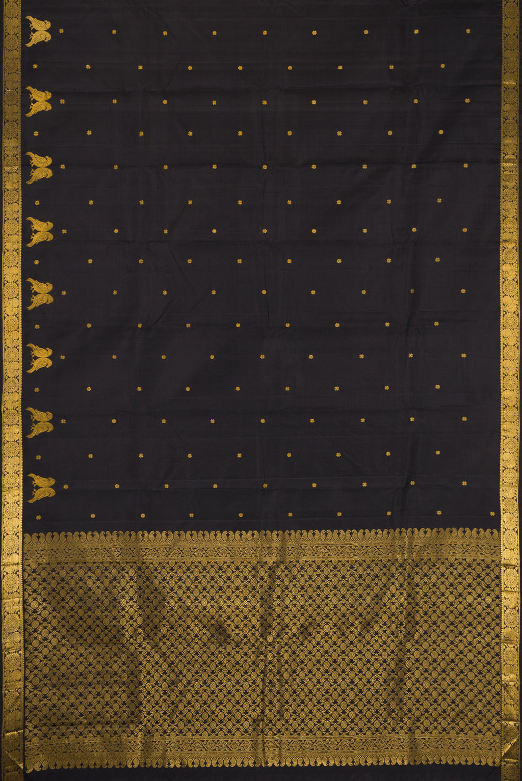 Flat view of Black Dual Tone Soft Silk Saree with Zari Butta on the body and Fancy Border. 