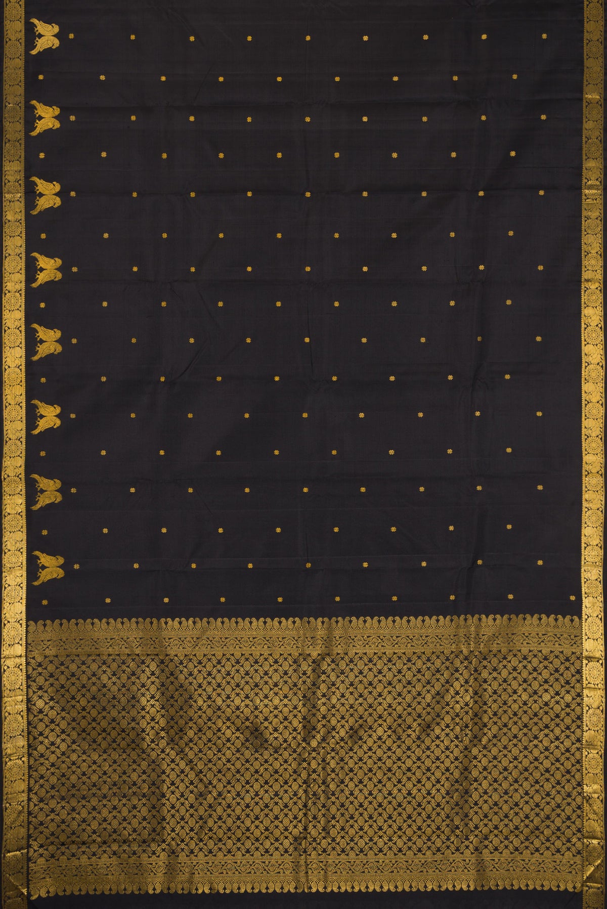 Flat view of Black Dual Tone Soft Silk Saree with Zari Butta on the body and Fancy Border. 