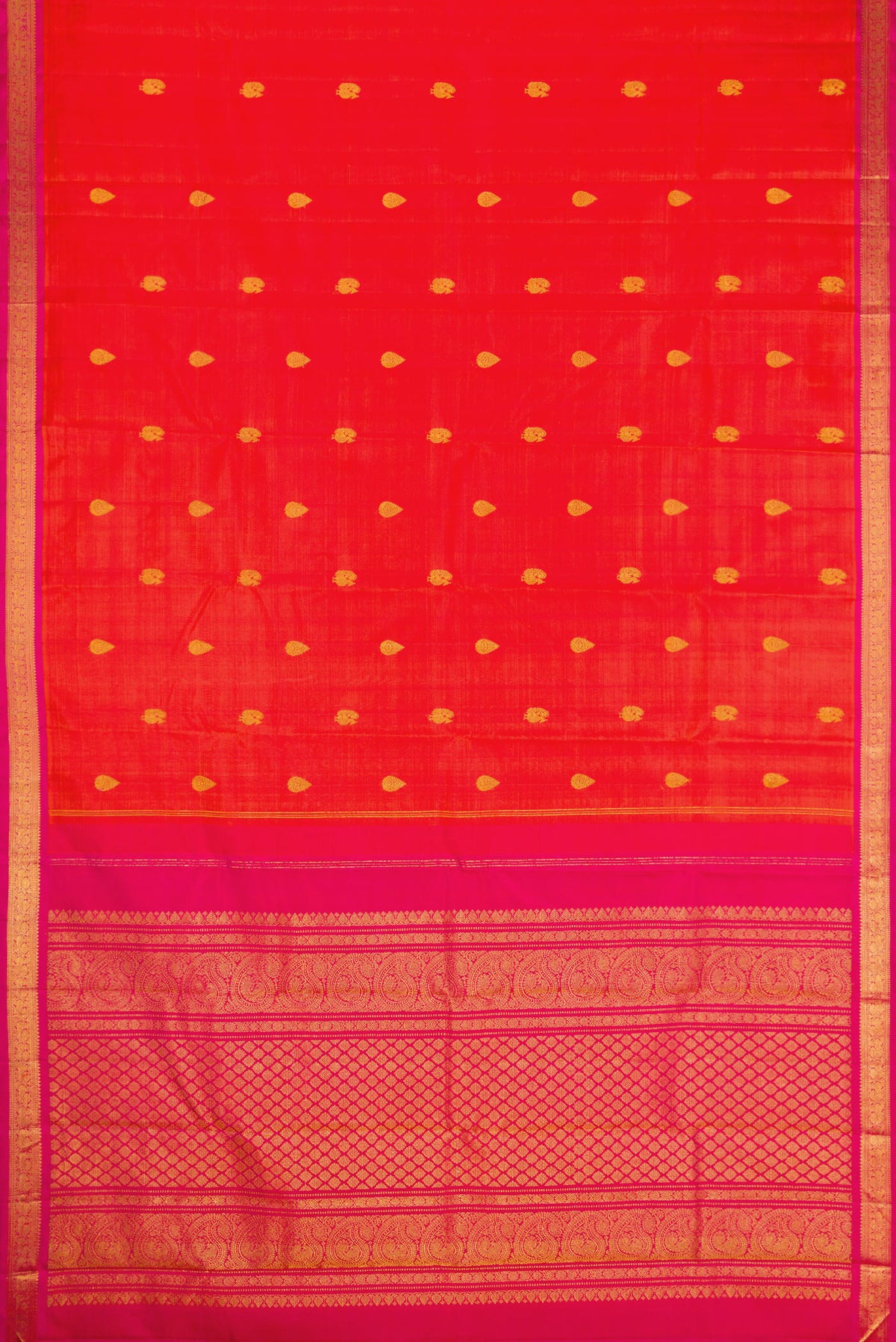 Flat view of Coral Dual Tone Kanchipuram Silk Saree with Zari Butta on the body and Zari Border. 