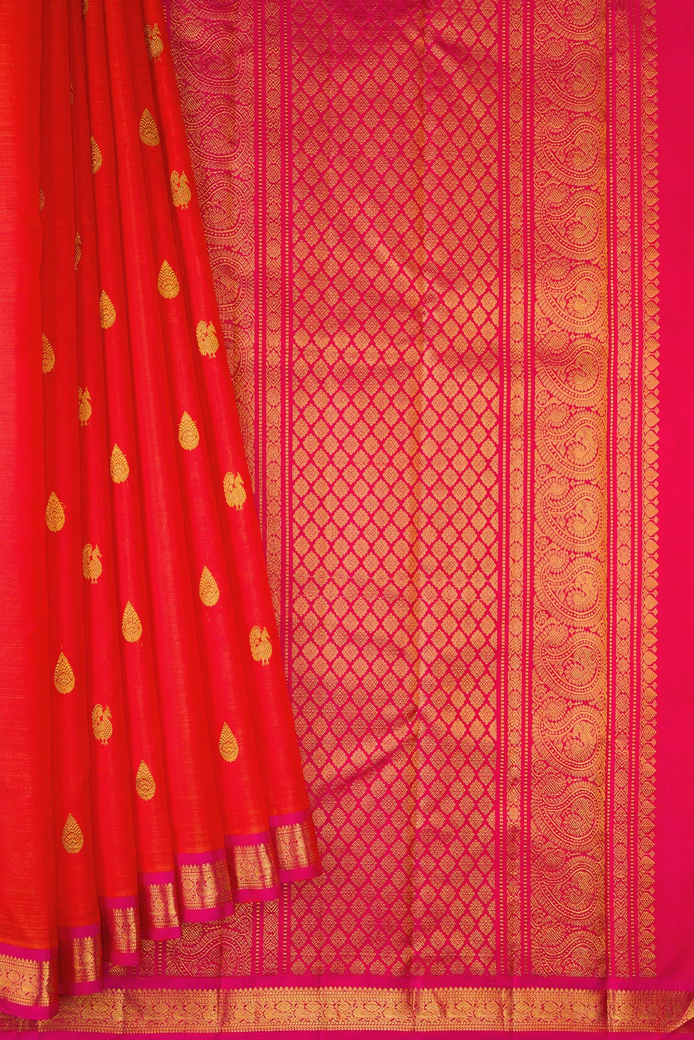 Pleats and pallu of Coral Dual Tone Kanchipuram Silk Saree with Zari Butta on the body and Zari Border. 