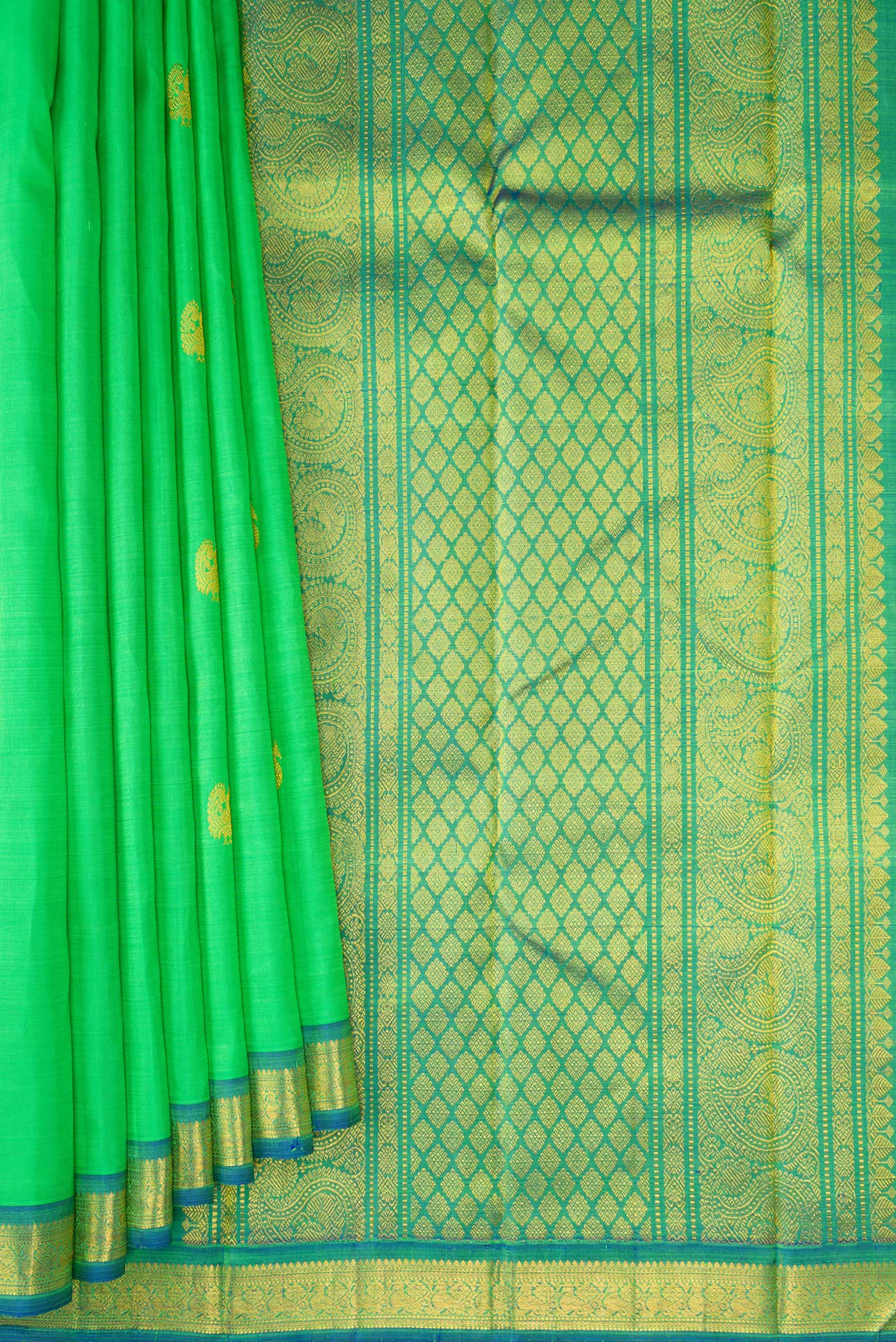 Pleats and pallu of Parrot Green Kanchipuram Silk Saree with Zari Butta on the body and Zari Border. 