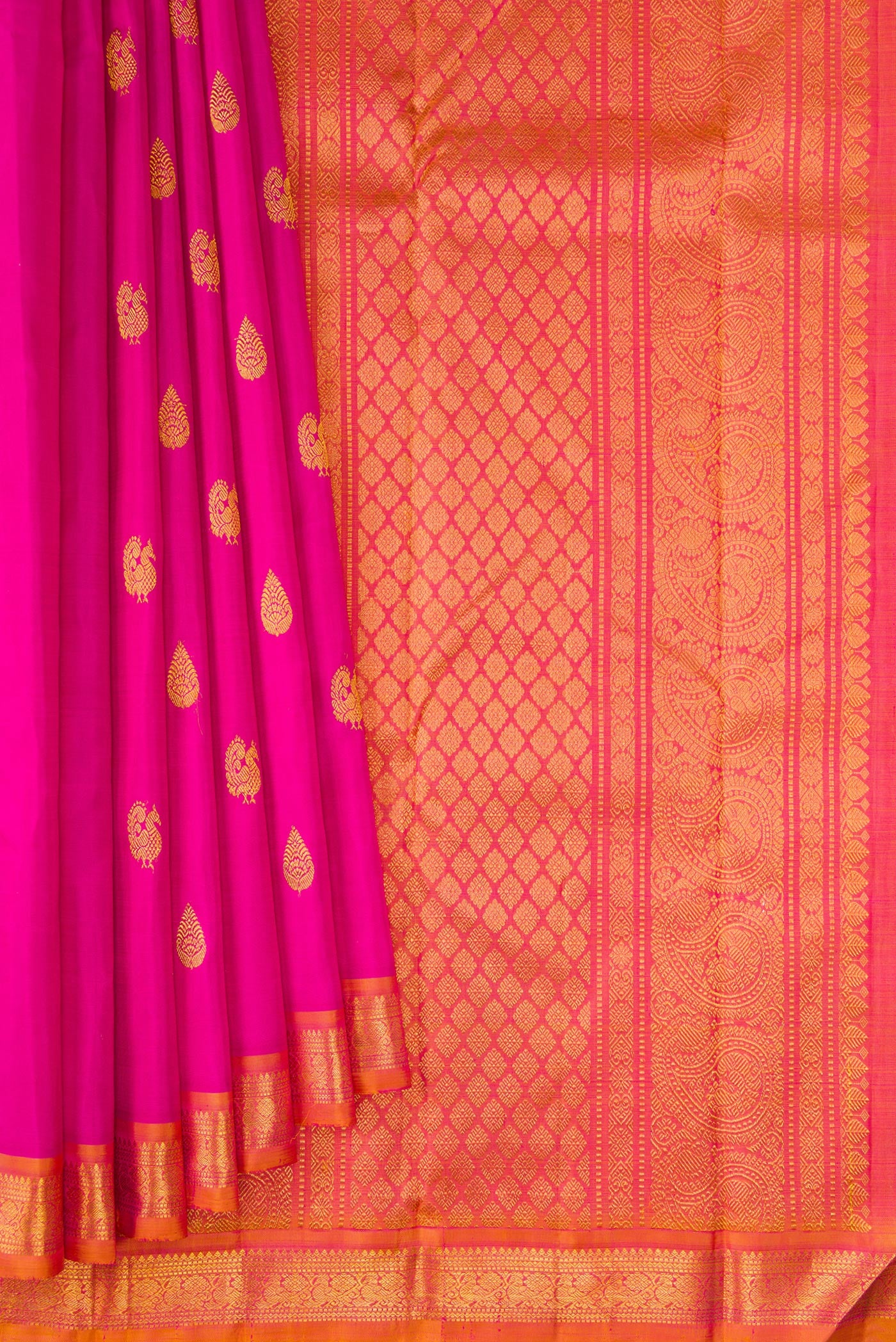 Pleats and pallu of Pink Kanchipuram Silk Saree with Zari Butta on the body and Zari Border. 