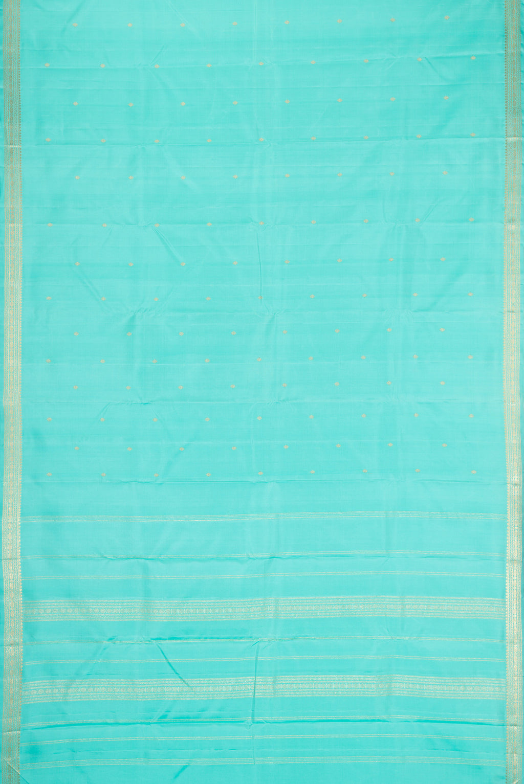 Flat view of Sky Blue Dual Tone Kanchipuram Silk Saree with Zari Butta on the body and Zari Border. 