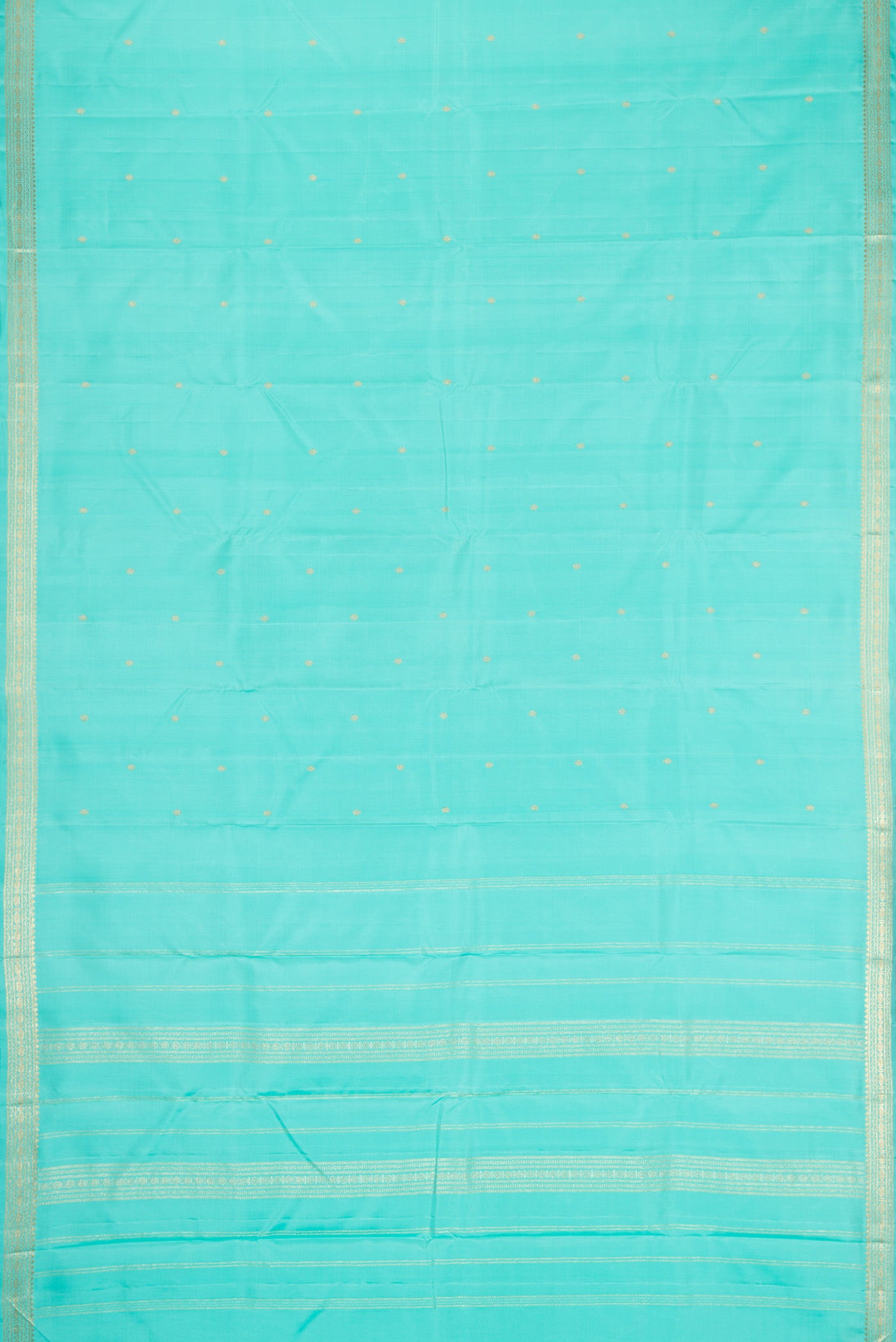 Flat view of Sky Blue Dual Tone Kanchipuram Silk Saree with Zari Butta on the body and Zari Border. 