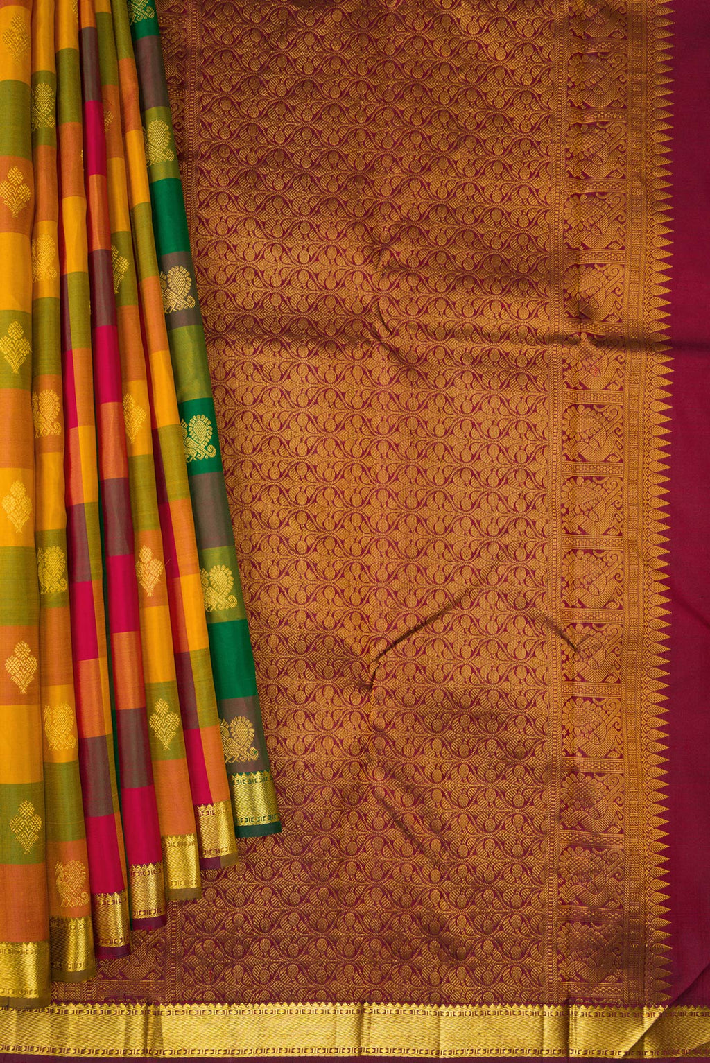 Pleats and pallu of Multi Color Kanchipuram Silk Saree with Checked design on the body and Zari Border. 