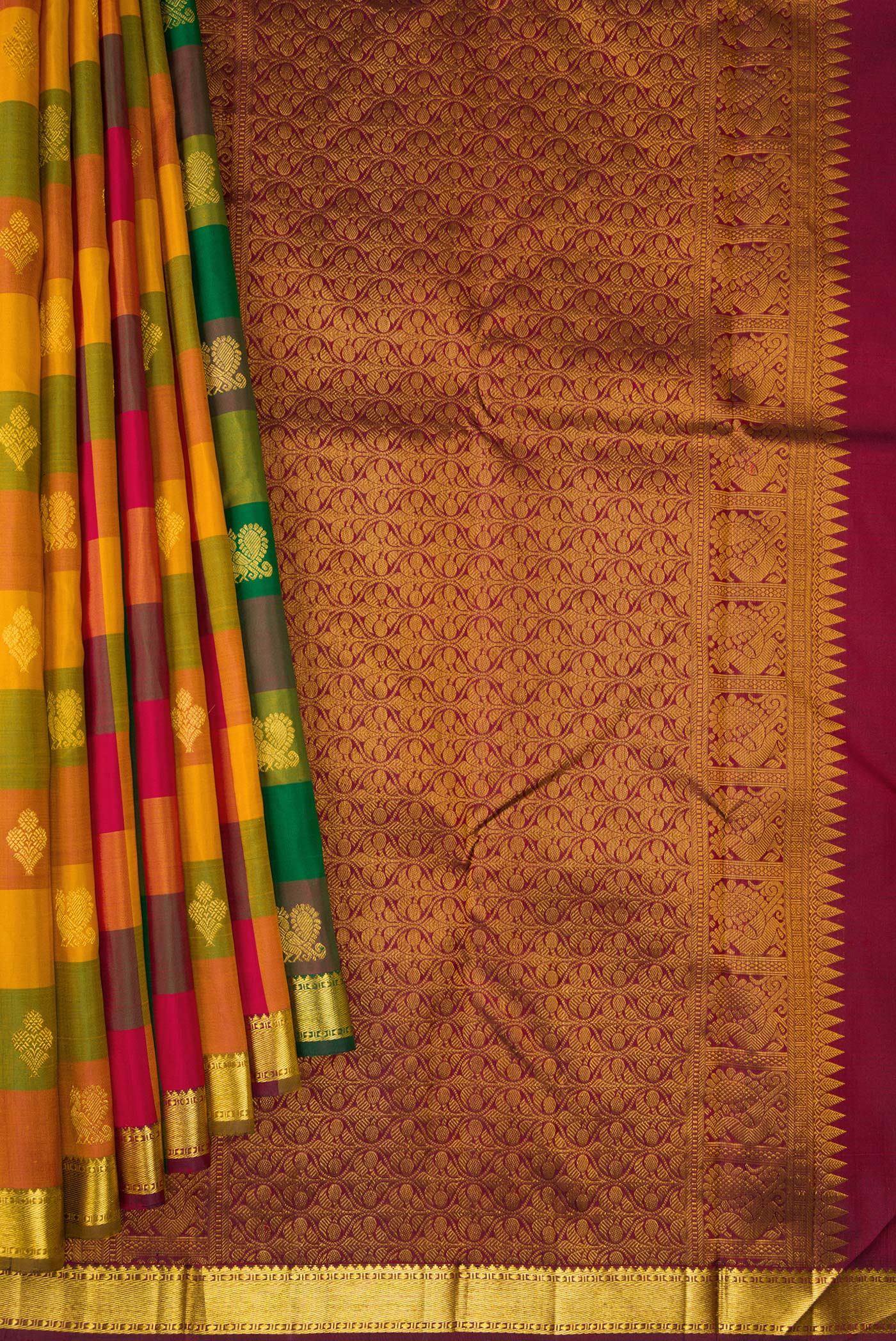 Pleats and pallu of Multi Color Kanchipuram Silk Saree with Checked design on the body and Zari Border. 