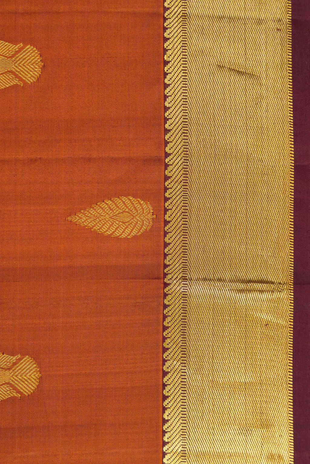 Border image of Brick Orange Dual Tone Kanjivaram Silk Saree with Zari Butta on the body and Zari Border. 