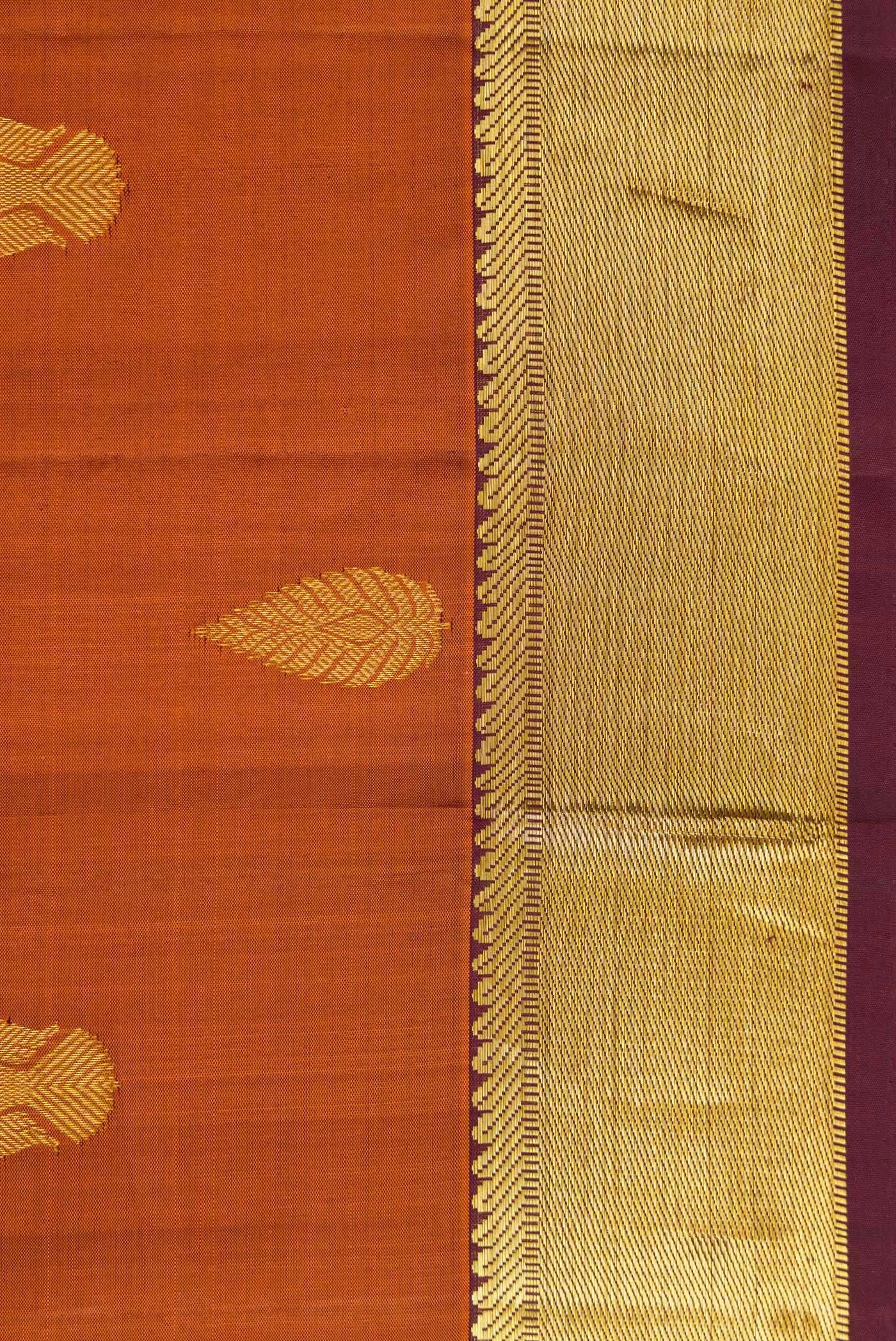 Border image of Brick Orange Dual Tone Kanjivaram Silk Saree with Zari Butta on the body and Zari Border. 