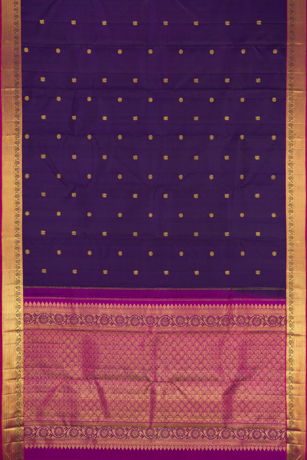 Flat view of Navy Blue Kanjivaram Silk Saree with Zari Butta on the body and Zari And Thread Border. 