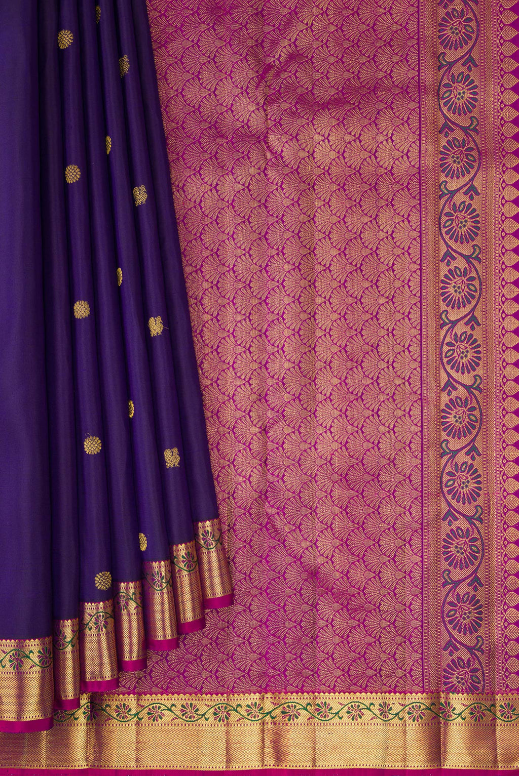 Pleats and pallu of Navy Blue Kanjivaram Silk Saree with Zari Butta on the body and Zari And Thread Border. 