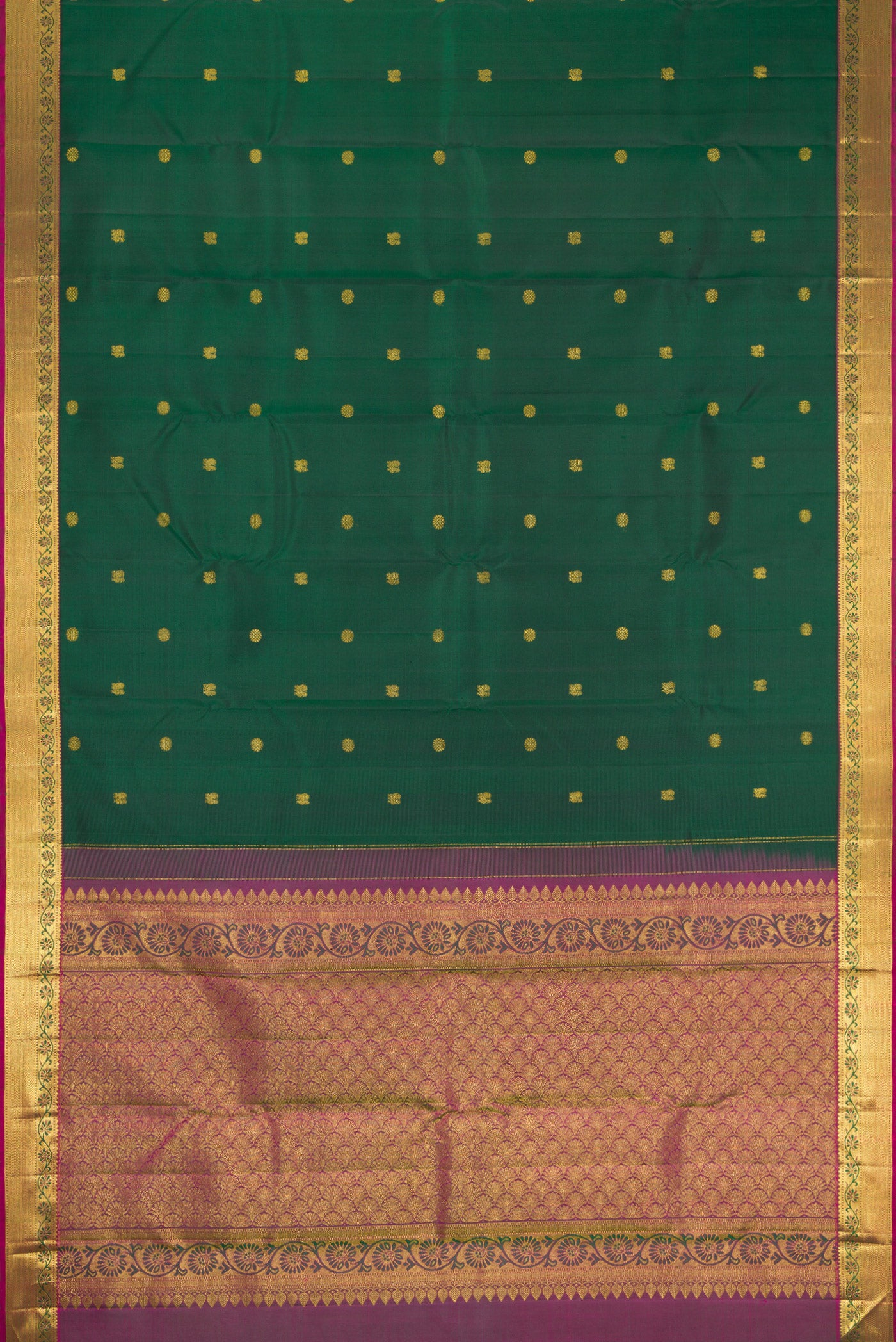 Flat view of Bottle Green Kanjivaram Silk Saree with Zari Butta on the body and Zari Border. 