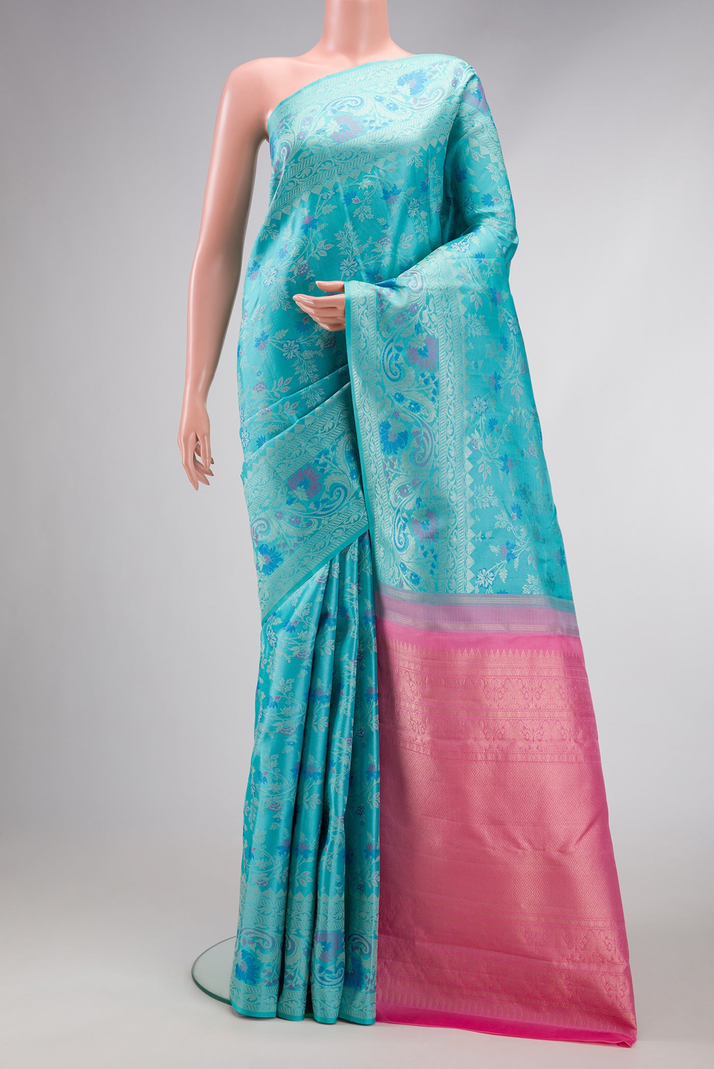 Sky Blue Dual Tone Kanjivaram Silk Saree with Jacquard design on the body and Fancy Border.  displayed on a mannequin