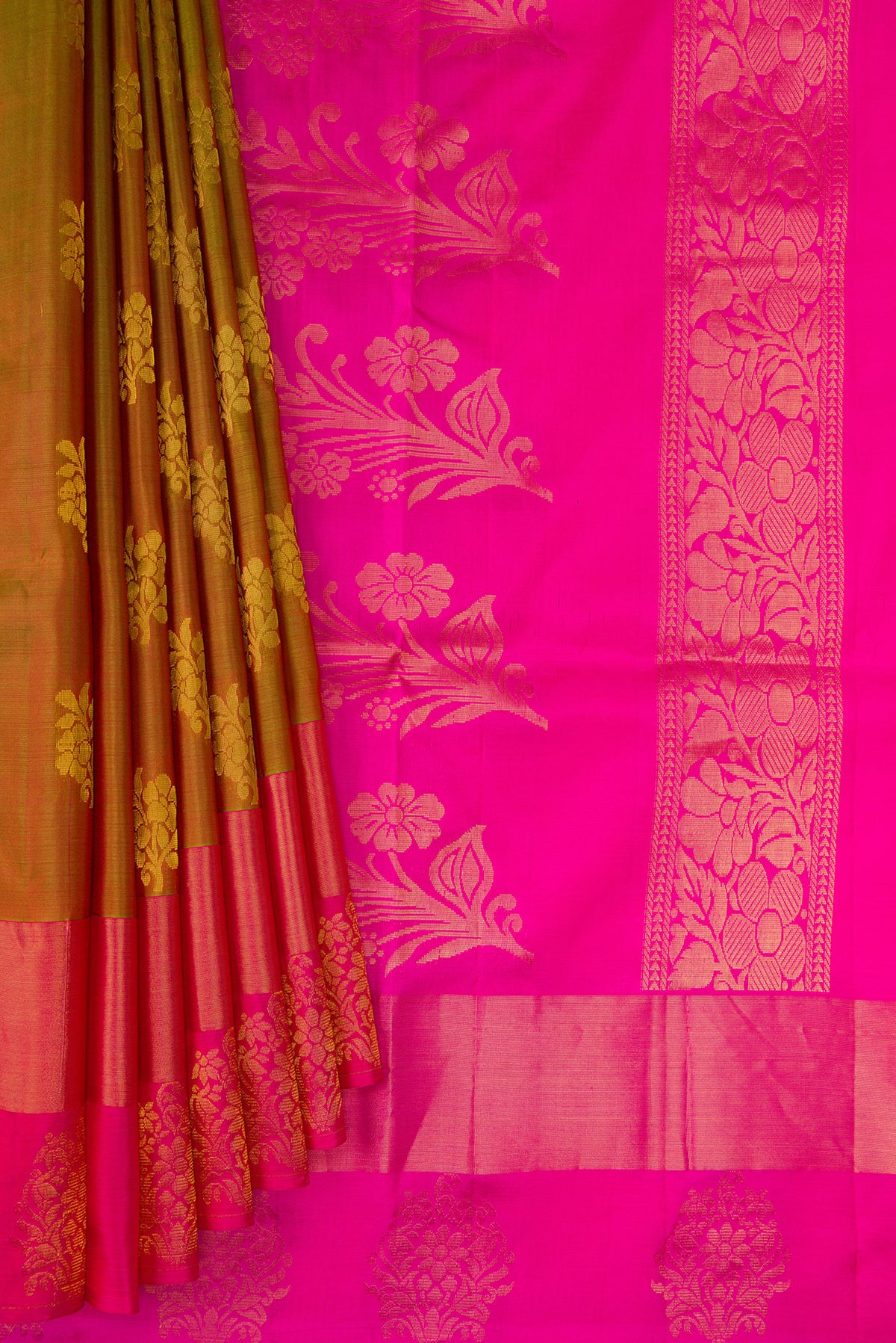 Pleats and pallu of Mehandi Green Dual Tone Soft Silk Saree with Zari Butta on the body and Fancy Border. 