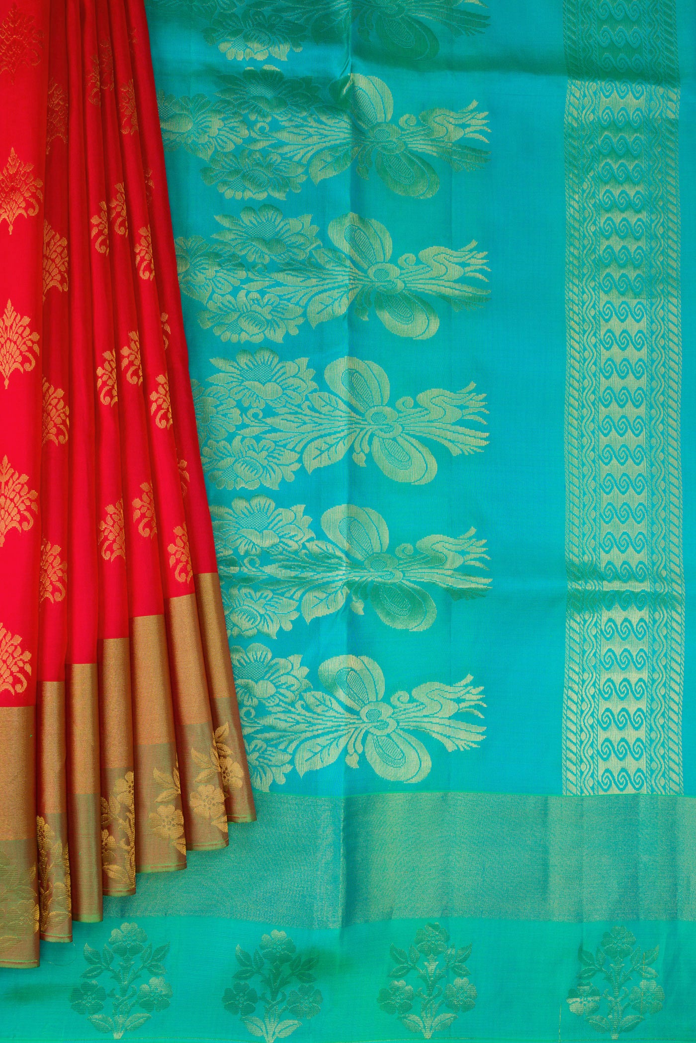 Pleats and pallu of Red Soft Silk Saree with Zari Butta on the body and Fancy Border. 