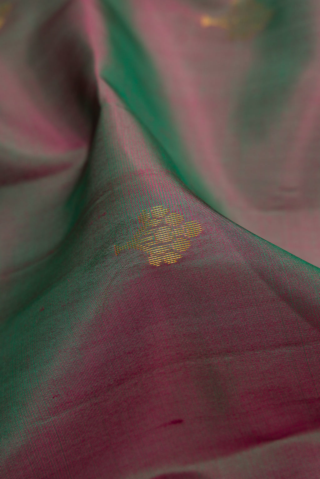 Close up of Multi Color Soft Silk Saree with Zari Butta on the body and Fancy Border.  displaying folds