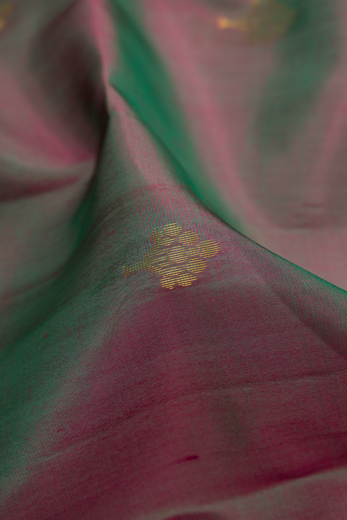 Close up of Multi Color Soft Silk Saree with Zari Butta on the body and Fancy Border.  displaying folds
